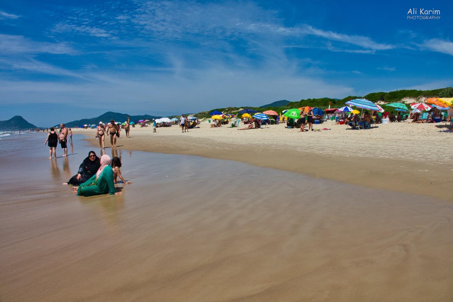Beach on the south part of the island had much cooler waters. Note the conservatively dressed muslim women; who I was told are typically Lebanese. Florianópolis, Brazil Beach on the south part of the island had much cooler waters. Note the conservatively dressed muslim women; who I was told are typically Lebanese.