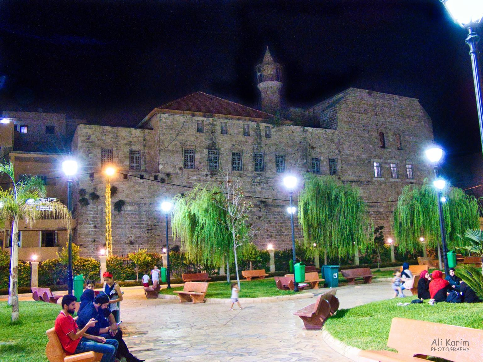 Nice park with local families chilling, El-Omari Grand mosque in the background Sidon and Tyre Nice park with local families chilling, el-Omari Grand mosque in the background