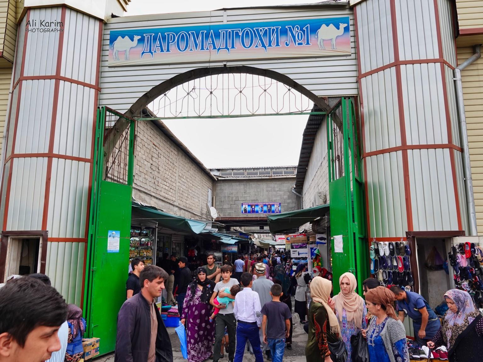 Entrance to the traditional clothing market in Korvon market; busy place More Dushanbe, Tajikistan Entrance to the traditional clothing market in Korvon market; busy place