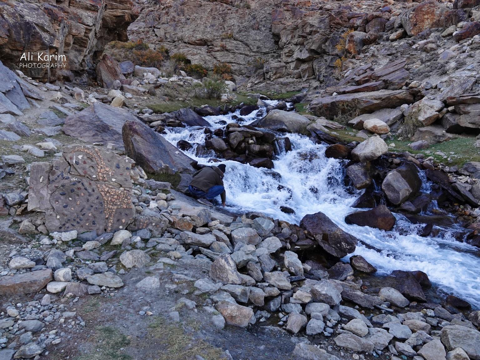 Langar, Tajikistan, Filling up on fresh drinking water from underground stream