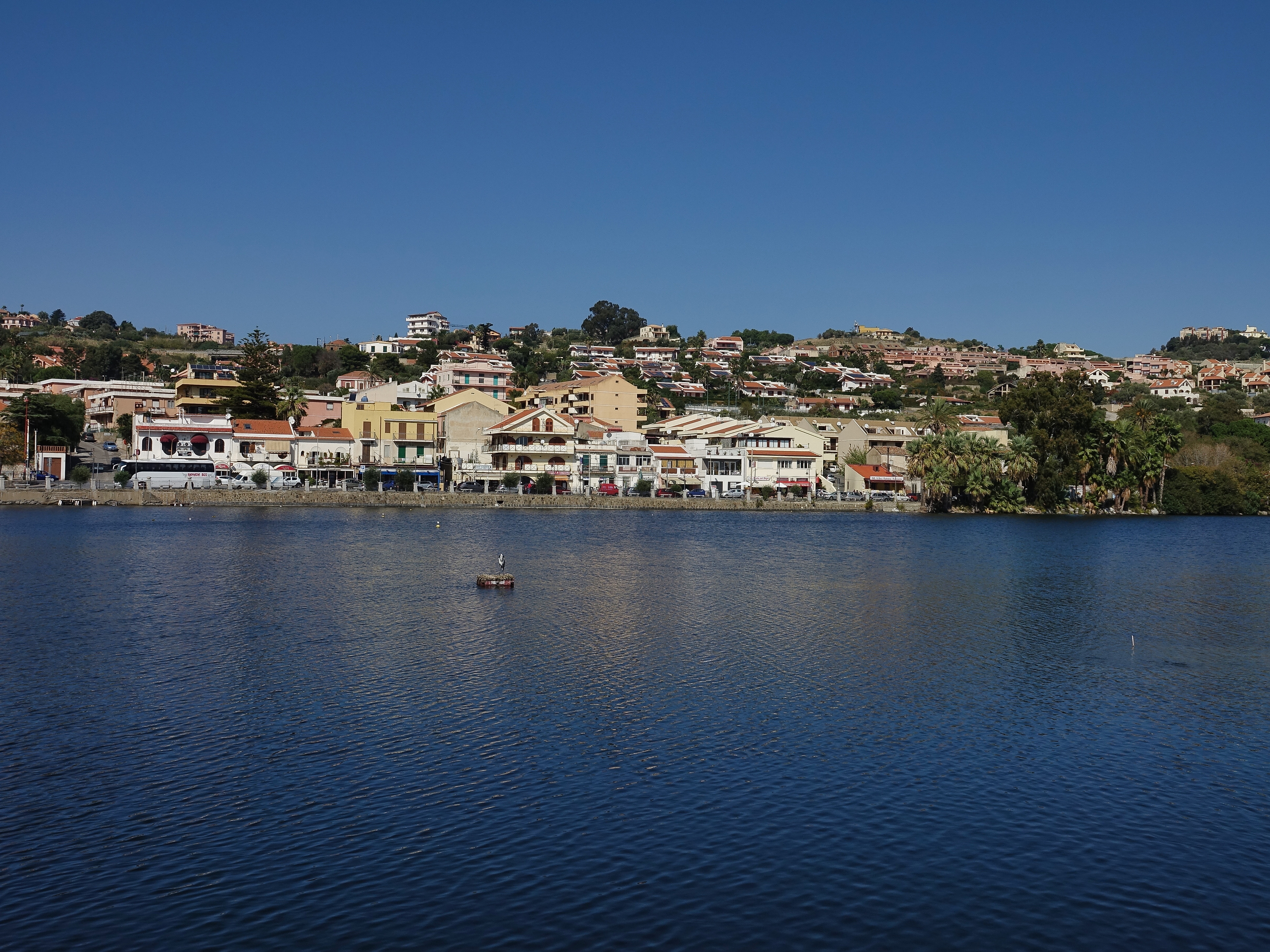 Torre Faro across its saltwater lake where Mussels abound Torre Faro across its saltwater lake where Mussels abound