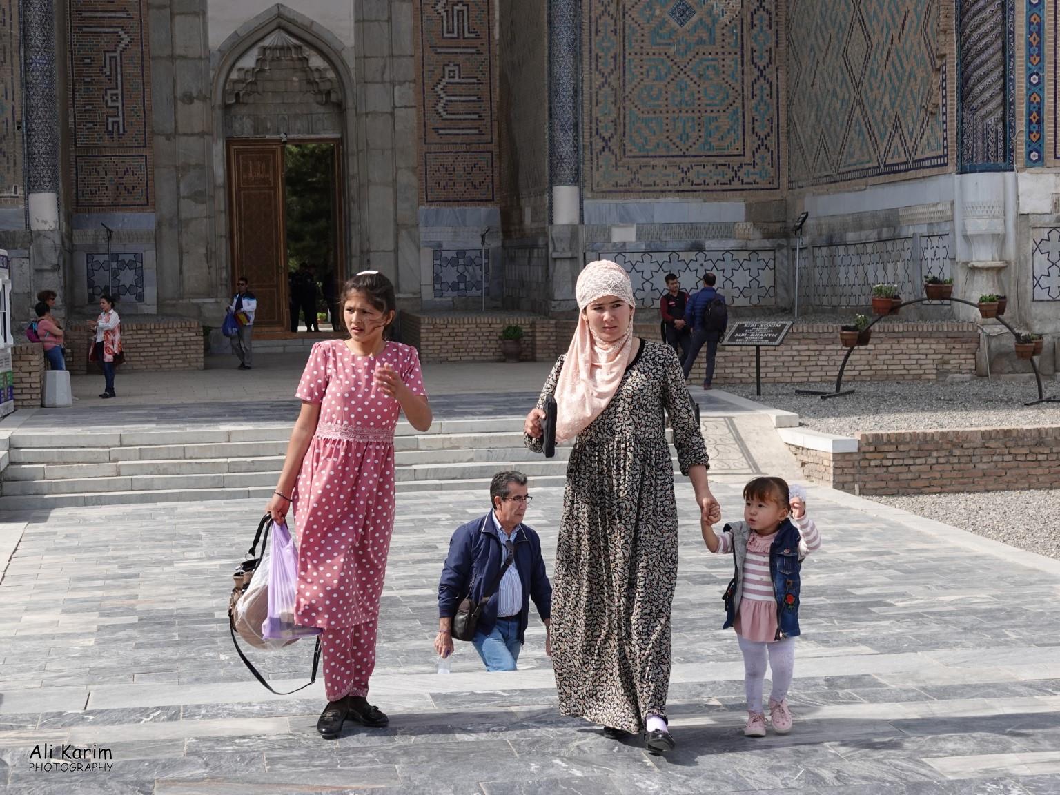 Families visiting the huge Bibi Khanym mosque complex that was still in the process of restoration More Samarkand, Families visiting the huge Bibi Khanym mosque complex that was still in the process of restoration