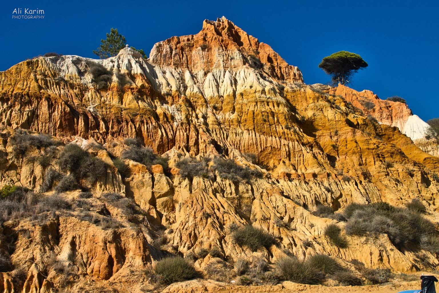 Impressive cliffs along the coastline Algarve, Portugal Impressive cliffs along the coastline