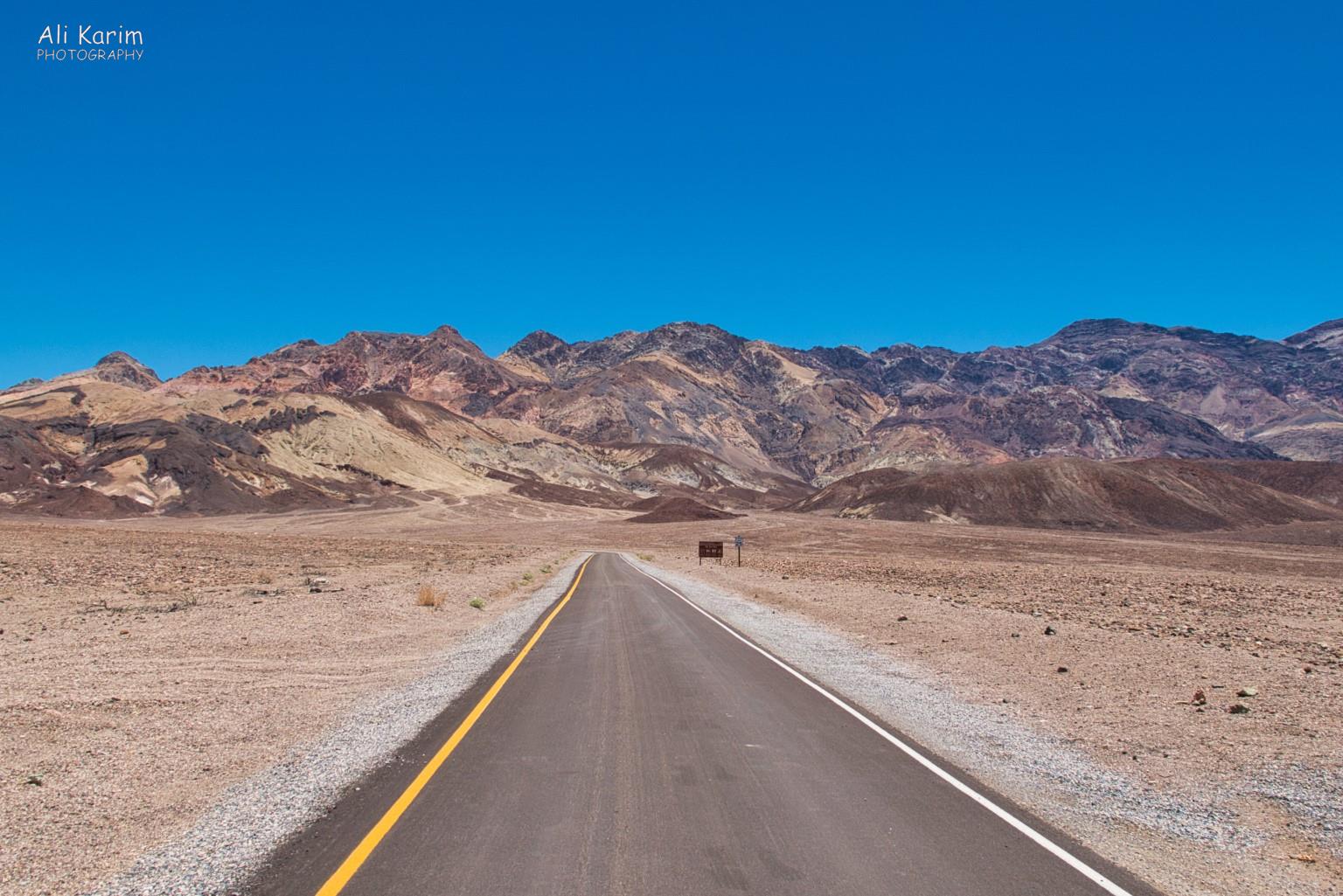 No roadblocks so far; Artists Palette hills in the background; colorful Death Valley National Park, June 2020, No roadblocks so far; Artists Palette hills in the background; colorful