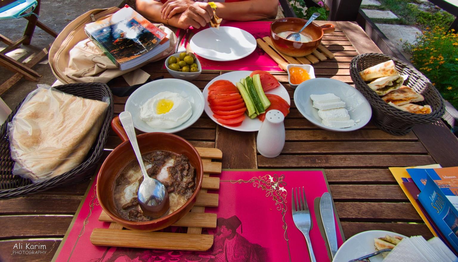Typical Druze breakfast of eggs fried with goat meat in a porcelain pan, with Manoushe, bread, olives, cheese, btter, marmalade, humus, tomato’s and cucumber. Druze and the Chouf Mountains Typical Druze breakfast of eggs fried with goat meat in a porcelain pan, with Manoushe, bread, olives, cheese, btter, marmalade, humus, tomato’s and cucumber.