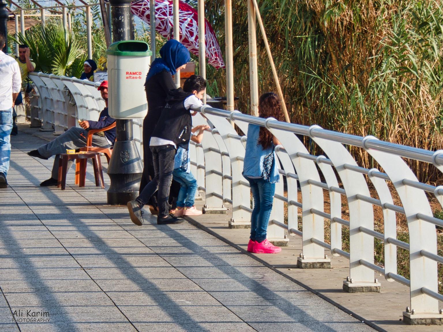 Mother and kids at the corniche Mother and kids at the corniche
