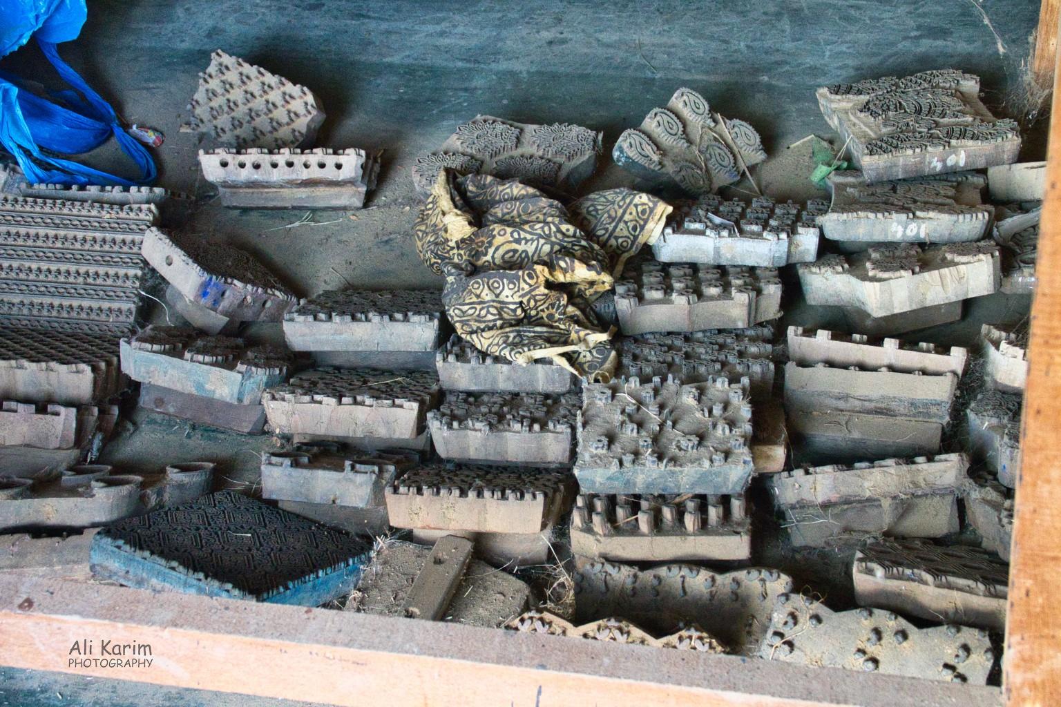 These are wood blocks, with designs carved in them, used to transfer designs onto rolls of cloth (example cloth included), called block print; done by the Khatri community. All done manually. Bhuj, Kutch, Gujarat These are wood blocks, with designs carved in them, used to transfer designs onto rolls of cloth (example cloth included), called block print; done by the Khatri community. All done manually.