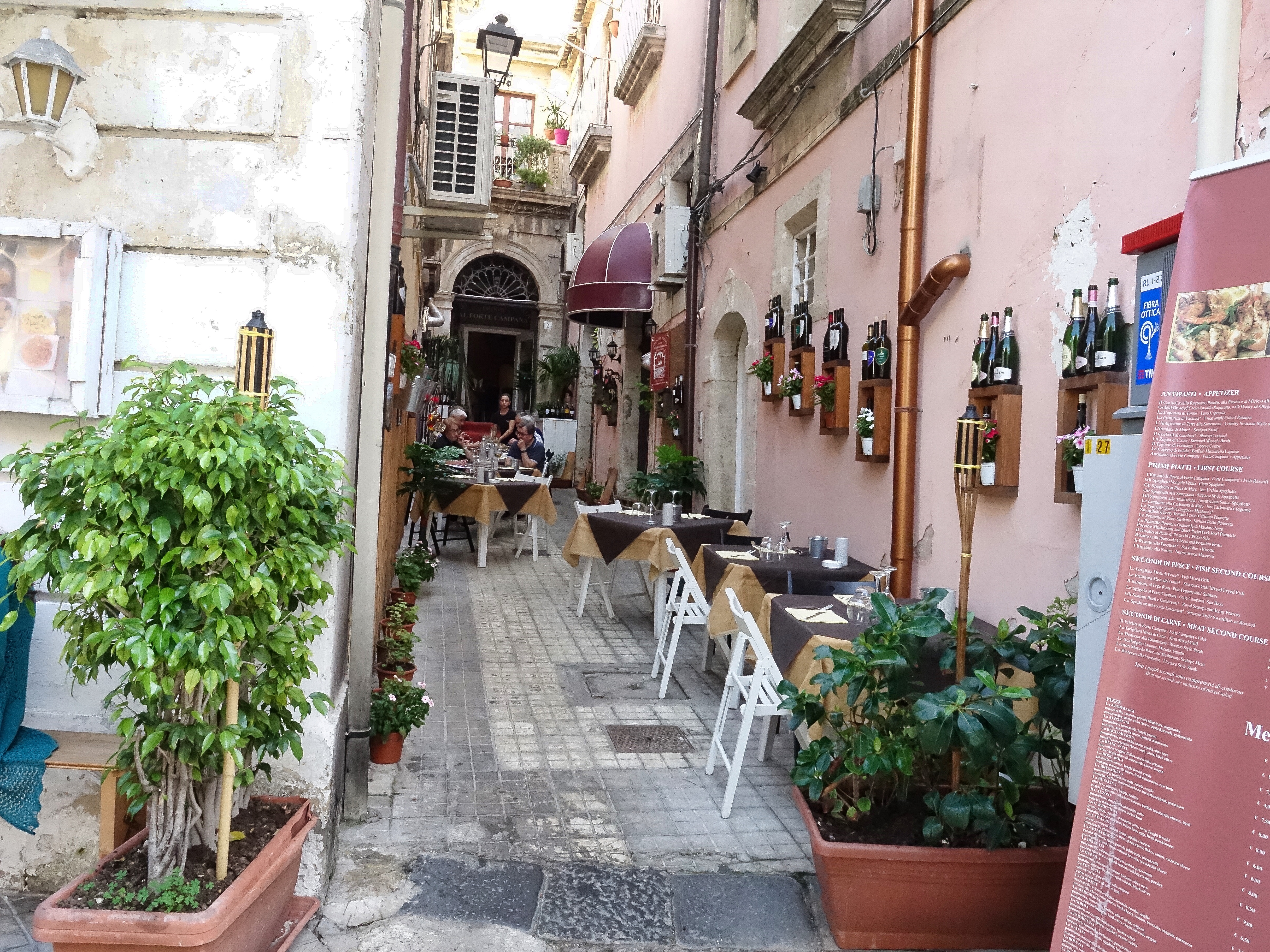 Alleyway restaurant; ready for the evening dinner trade Alleyway restaurant; ready for the evening dinner trade