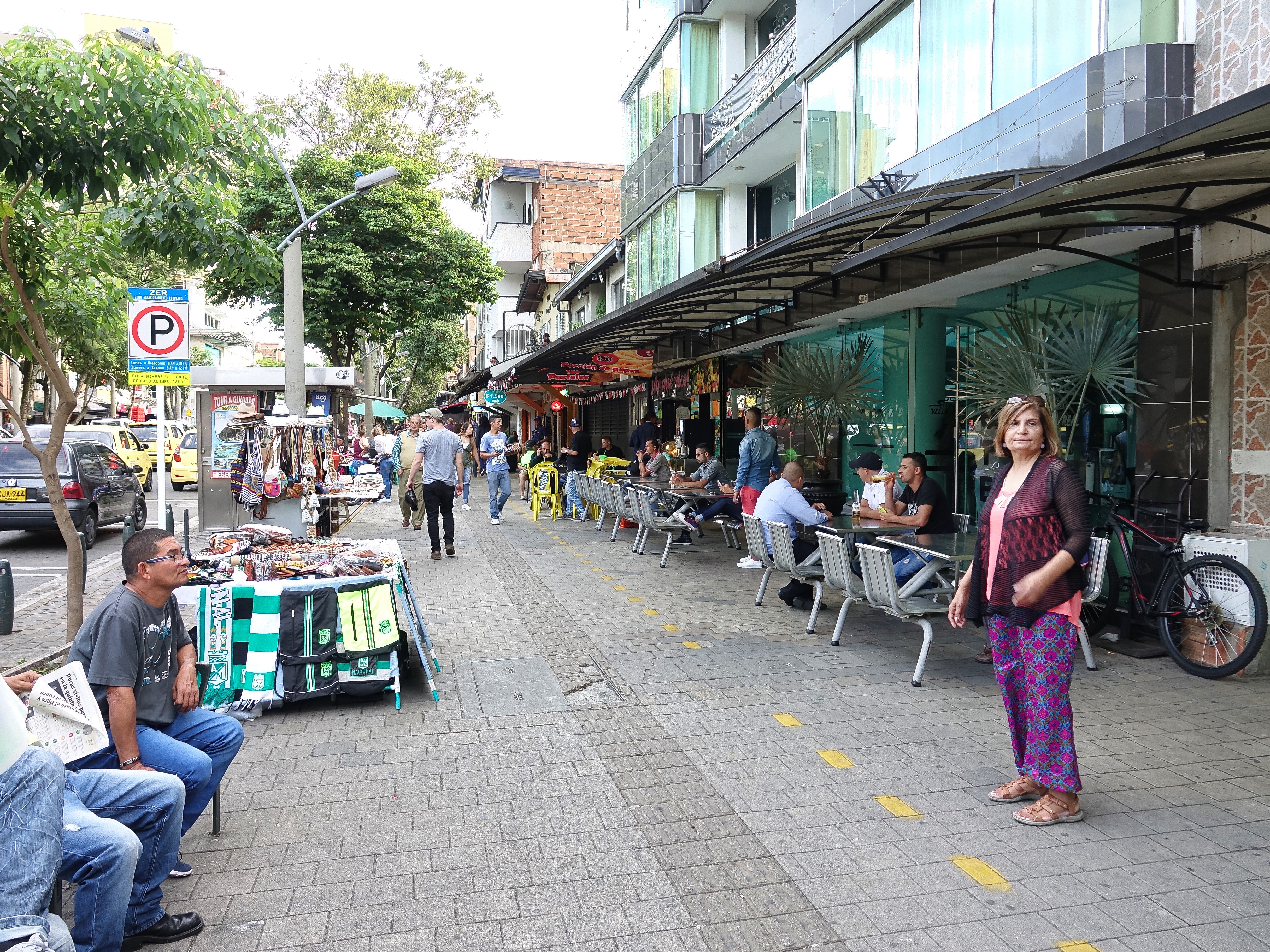 Laureles had lots of sidewalk cafes and restaurants Laureles had lots of sidewalk cafes and restaurants