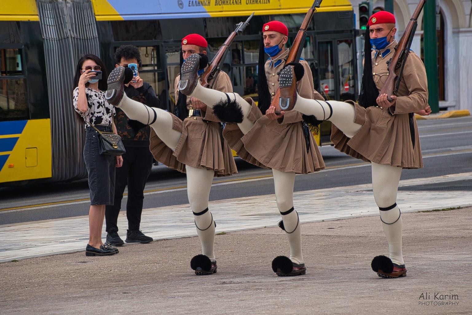 Evones guards marching to the monument. Note the horseshoes and pompoms on their boots More Athens, Greece, May 2021, Evones guards marching to the monument. Note the horseshoes and pompoms on their boots