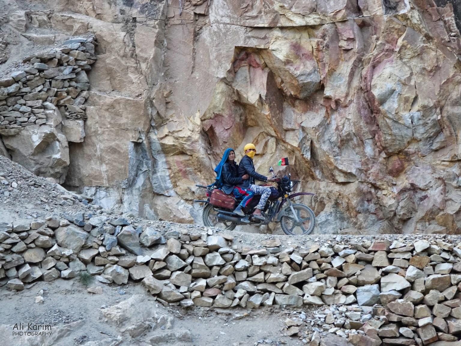 Riders on the Afghan side, checking us out. The drop to the Panj river was very steep here. Dushanbe, Tajikistan Riders on the Afghan side, checking us out. The drop to the Panj river was very steep here.