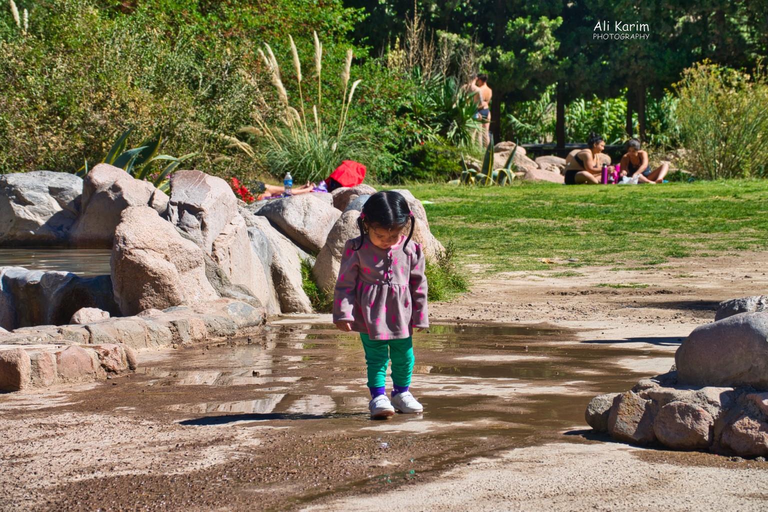 Niña checking out the Parque in detail Mendoza, Argentina Niña checking out the Parque in detail