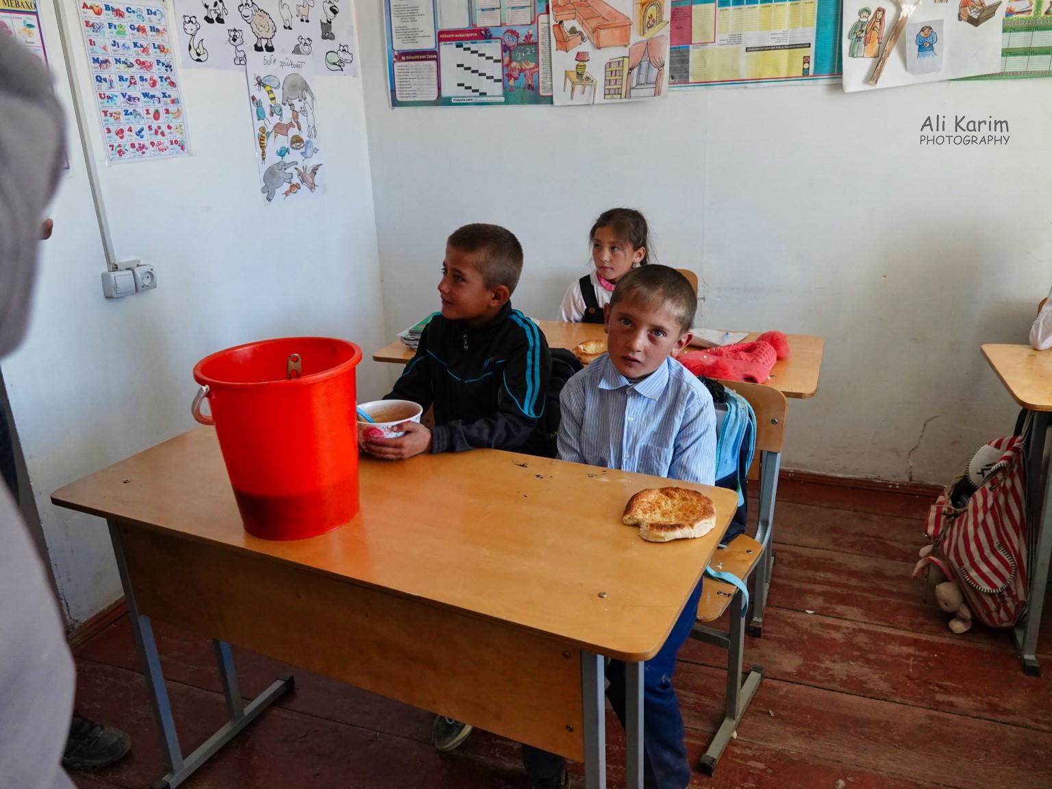 The red bucket had Apricot soup for lunch Langar, Tajikistan, The red bucket had Apricot soup for lunch