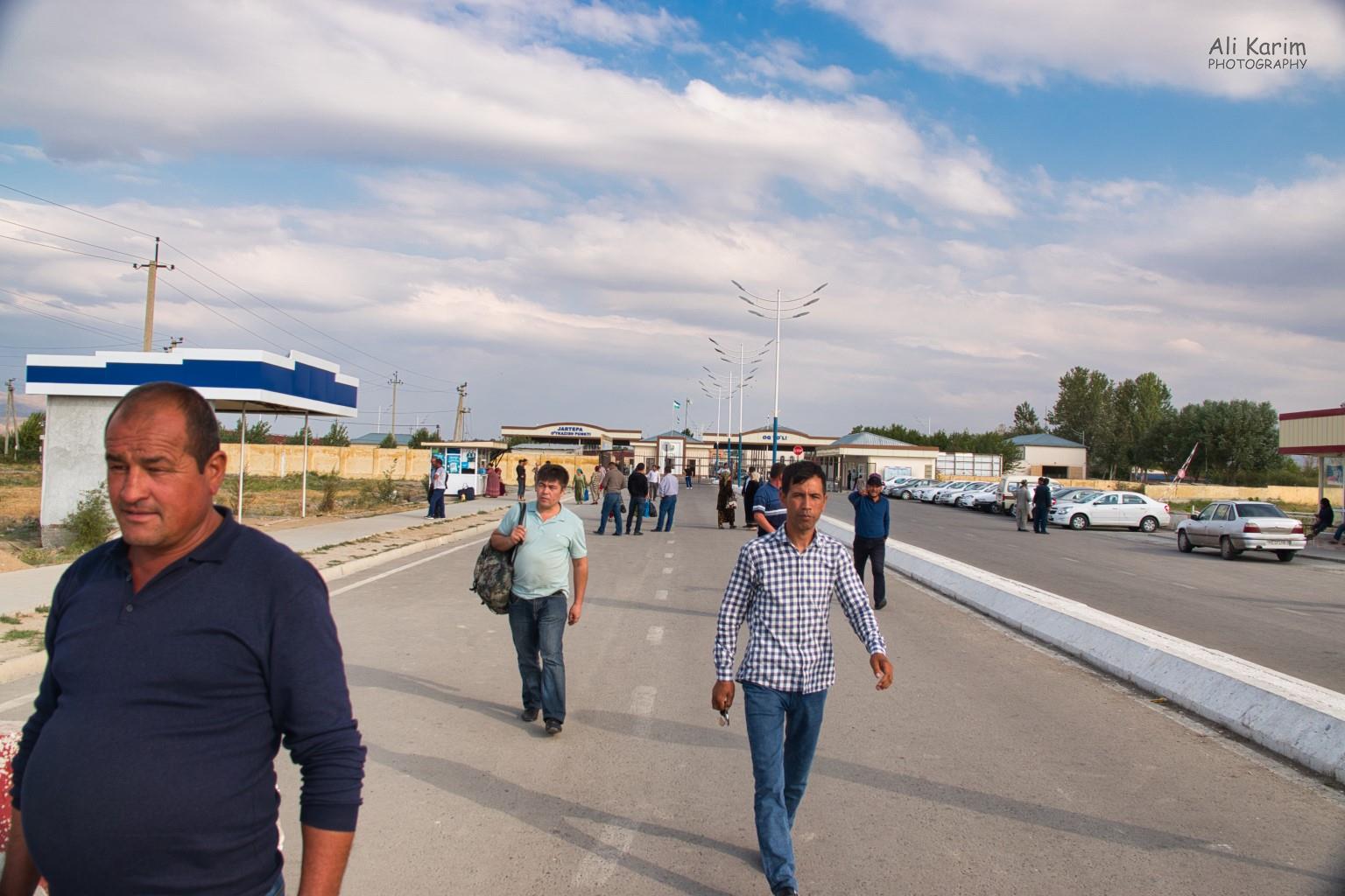 Uzbek side of the border; taxis lined up on the right ready to take one to Samarkand Samarkand, Uzbekistan Uzbek side of the border; taxis lined up on the right ready to take one to Samarkand