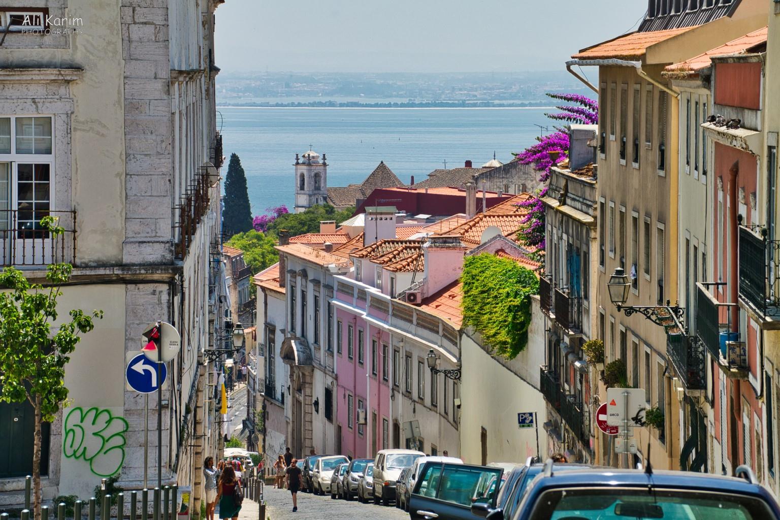 Street view leading to the water Lisbon Portugal: Street view leading to the water