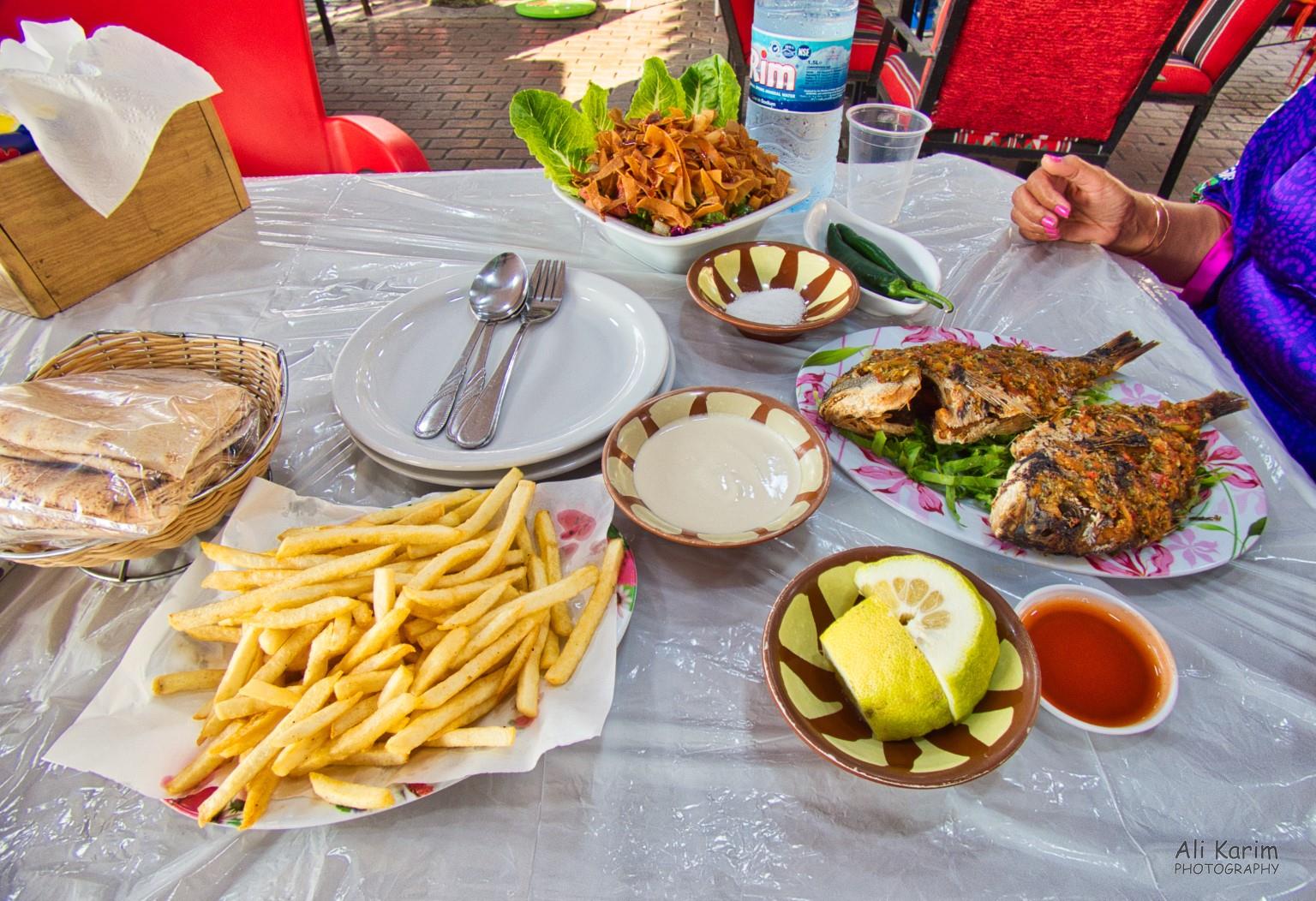Dinner of fresh fish, fries and salad Sidon and Tyre Dinner of fresh fish, fries and salad