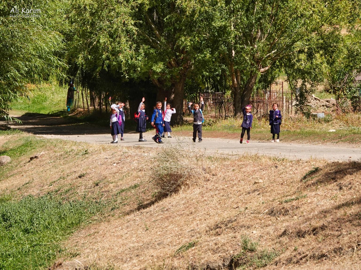 Friendly schoolchildren on their way home from school Onto Khorog, Tajikistan, Friendly schoolchildren on their way home from school