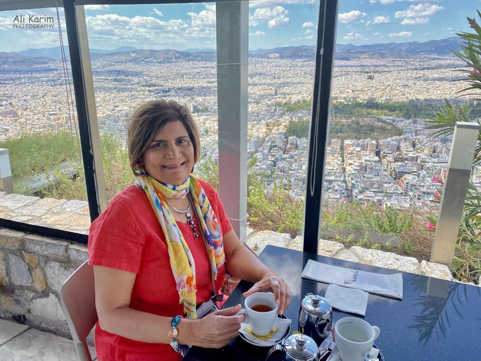 Teatime break at the cafeteria high above Athens More Athens, Greece, May 2021, Teatime break at the cafeteria high above Athens