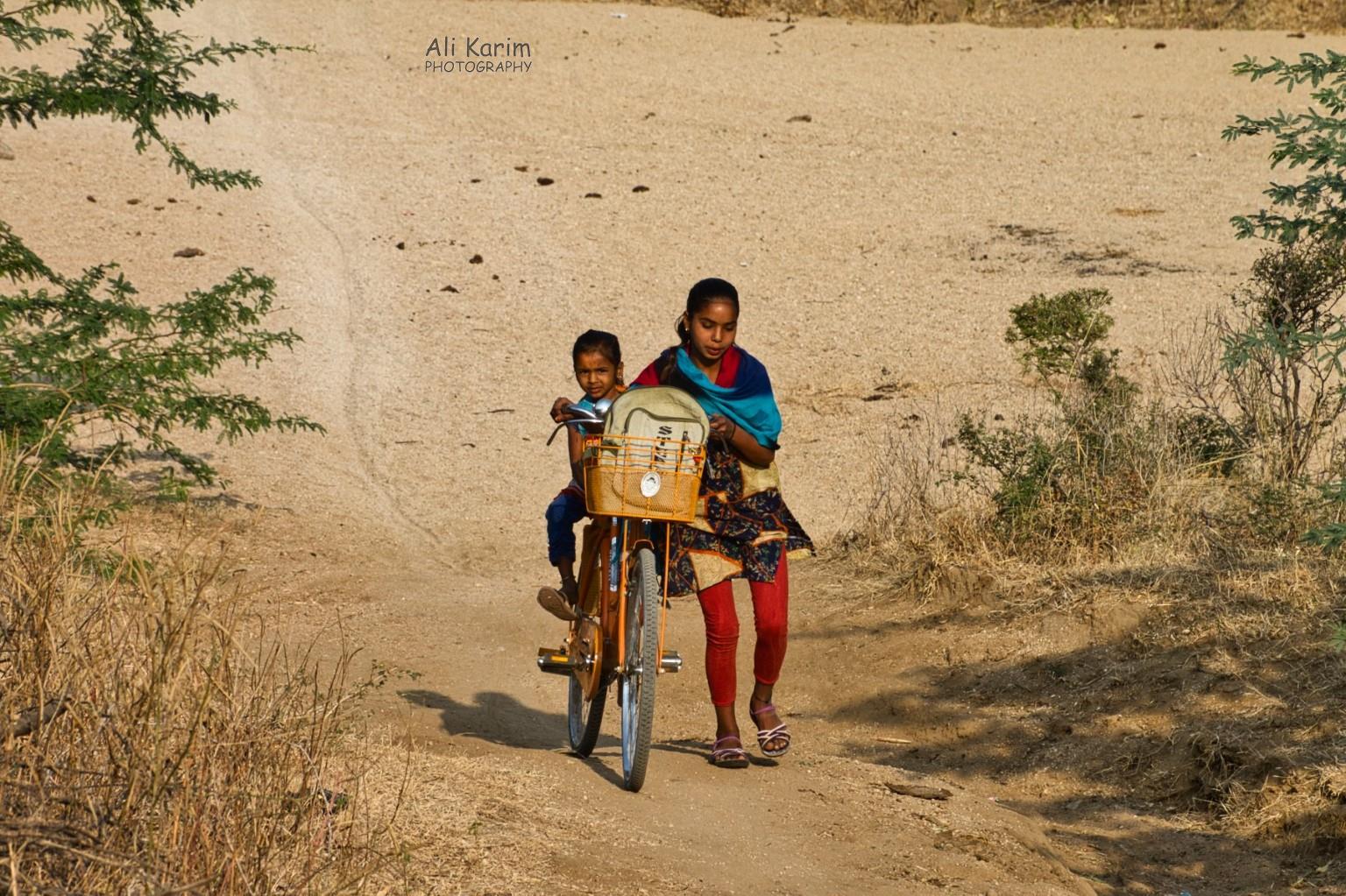 Young village girls off to school Leopards, Bera, Rajasthan Young village girls off to school