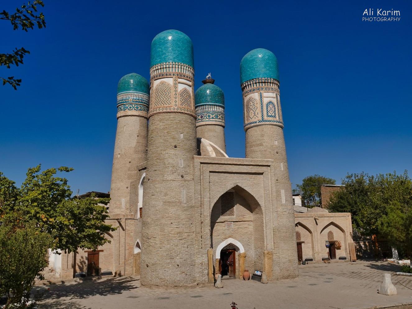 Chor Minor ancient madrassa complex. Chor refers to the 4 minarets. Note the nesting birds on top of one minaret Bukhara, Oct 2019, Chor Minor ancient madrassa complex. Chor refers to the 4 minarets. Note the nesting birds on top of one minaret