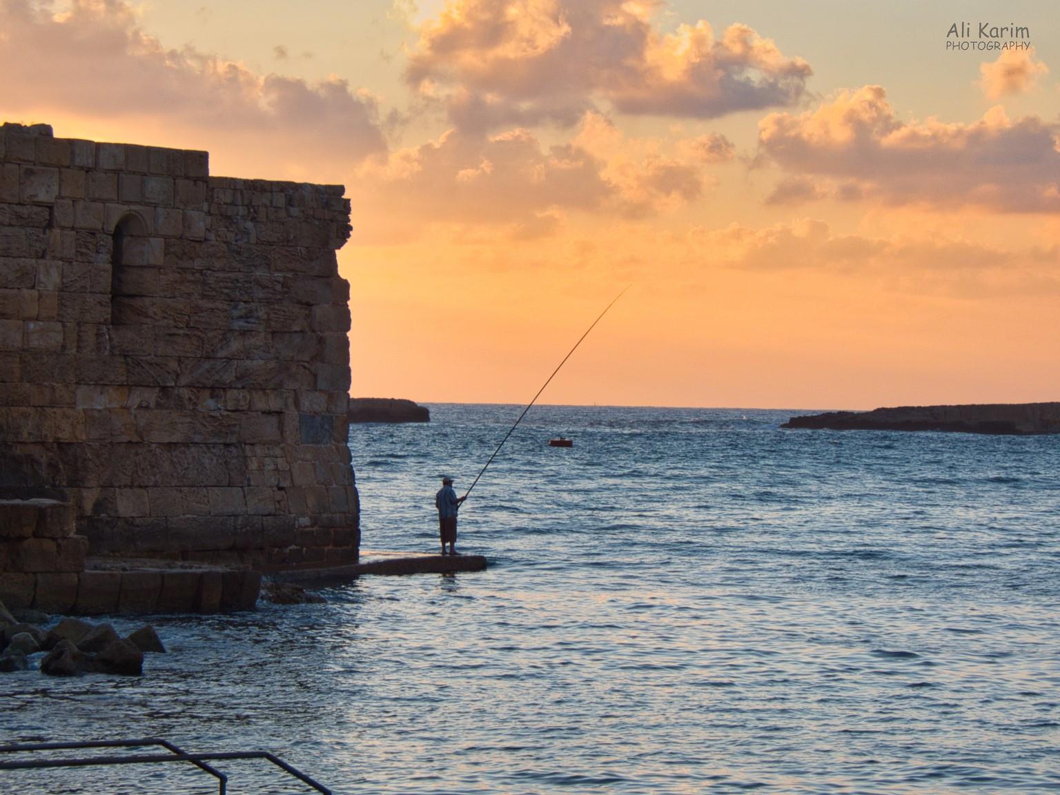 Sunset at the castle, diehard fisherman Sidon and Tyre Sunset at the castle, diehard fisherman
