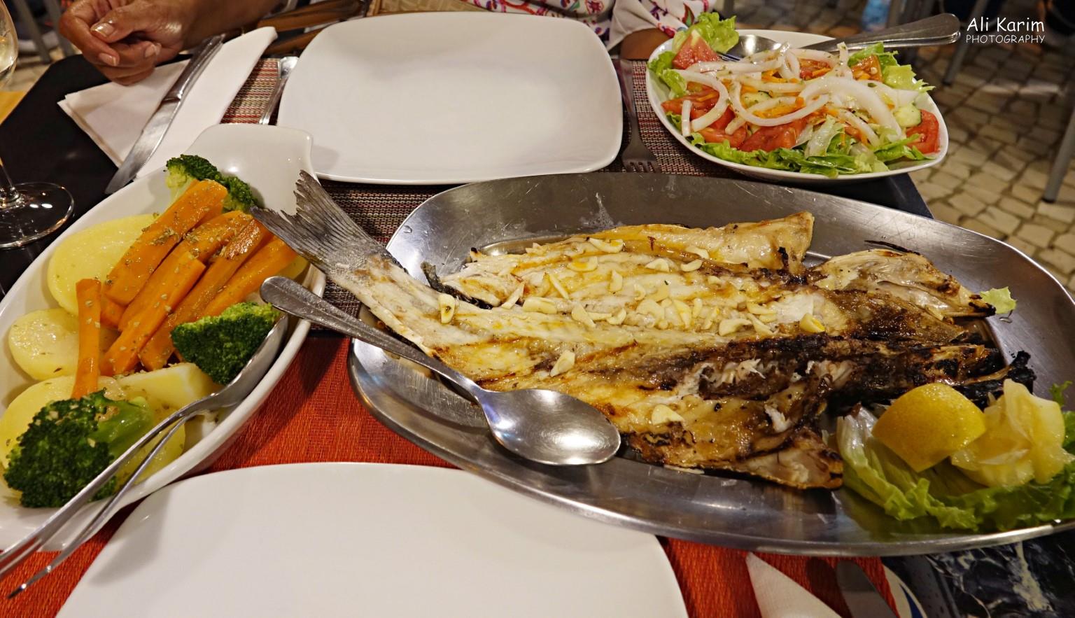 Seafood dinner at a local nearby restaurant in Albufera Algarve, Portugal Seafood dinner at a local nearby restaurant in Albufera