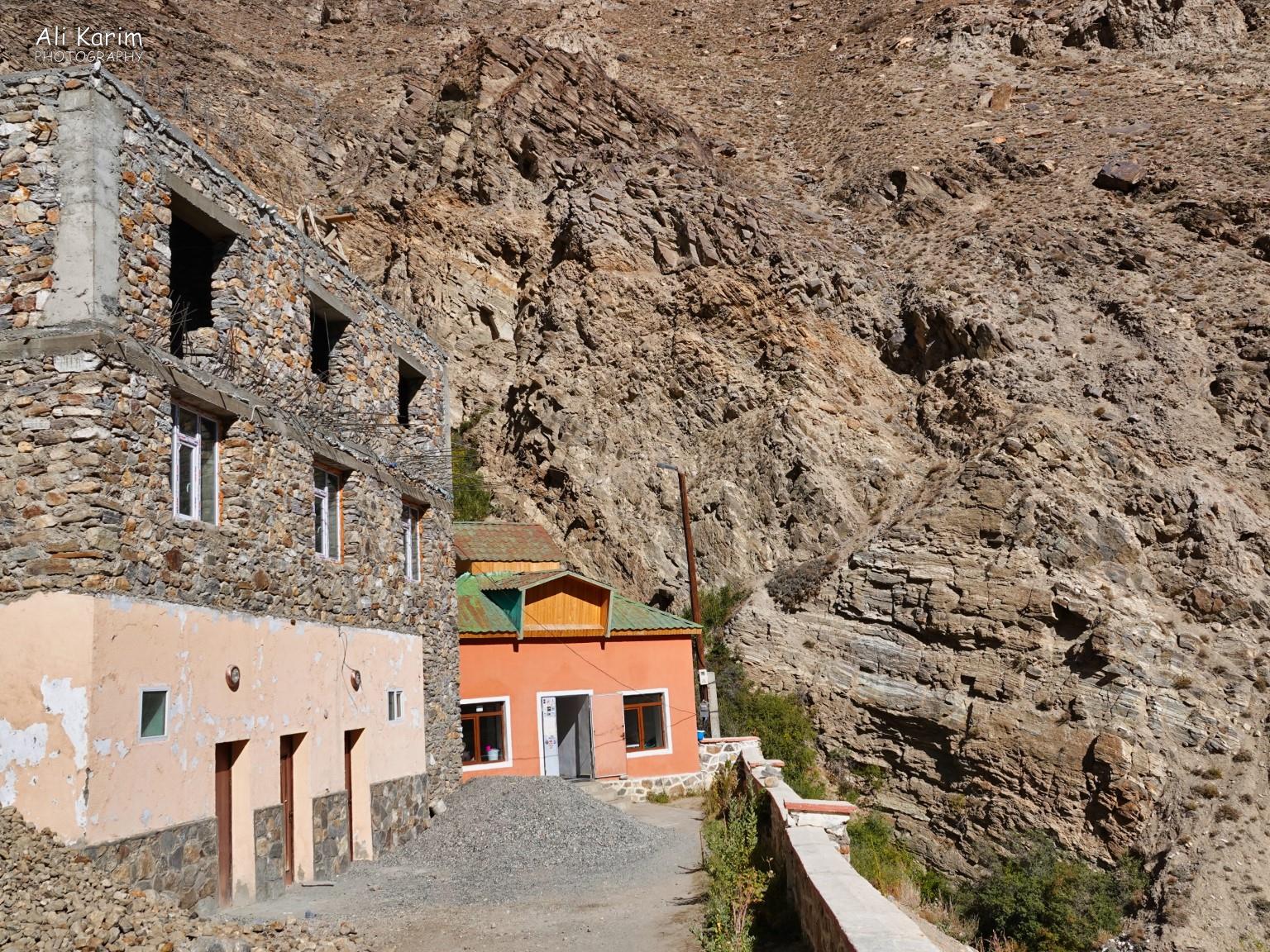 Bibi Fatima hot springs were behind the orange building, located in a narrow cleft between the mountain-sides Langar, Bulunkul Tajikistan, Bibi Fatima hot springs were behind the orange building, located in a narrow cleft between the mountain-sides