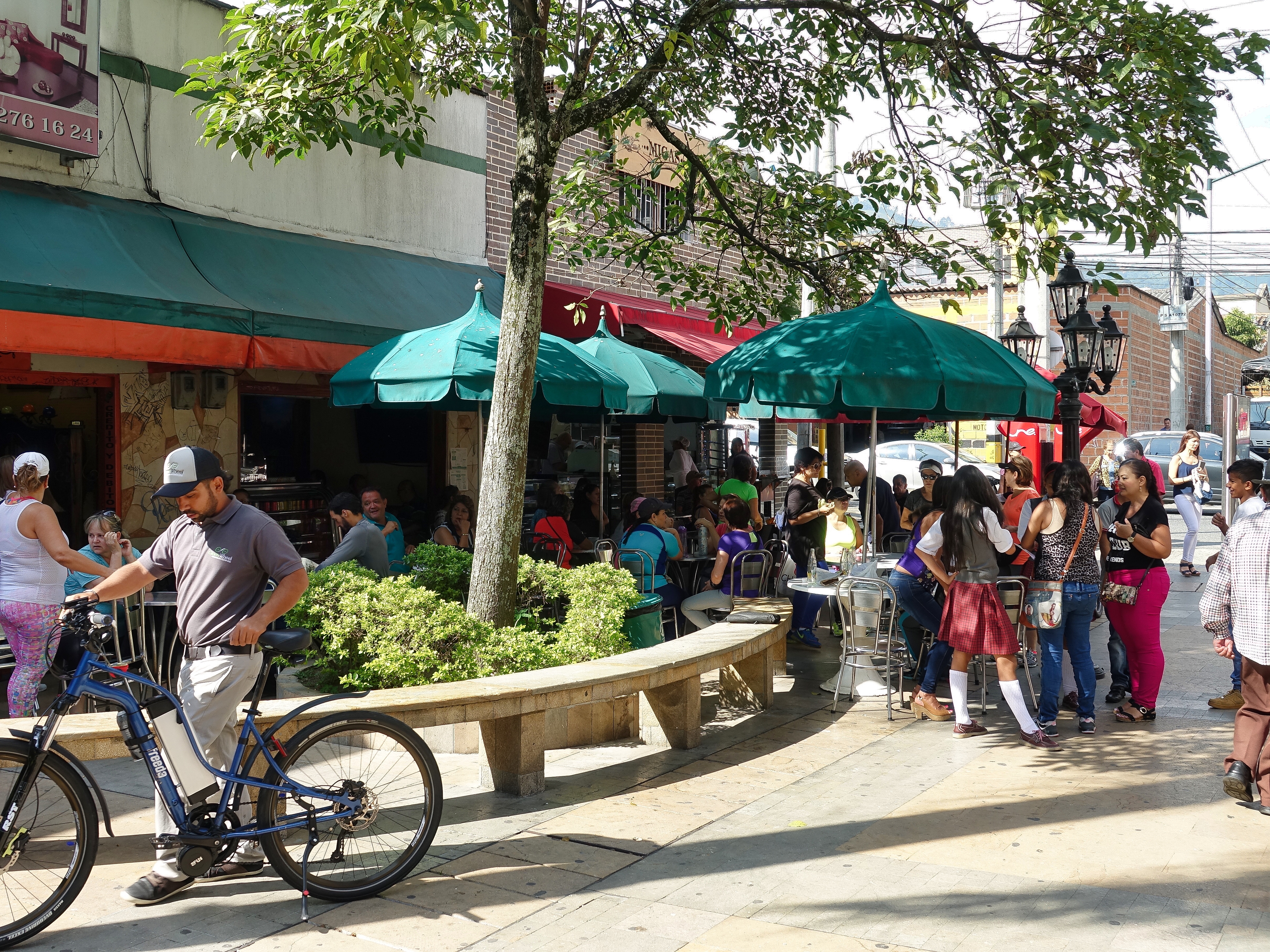 Cafes, and people everywhere in Envigado. Cafes, and people everywhere in Envigado.