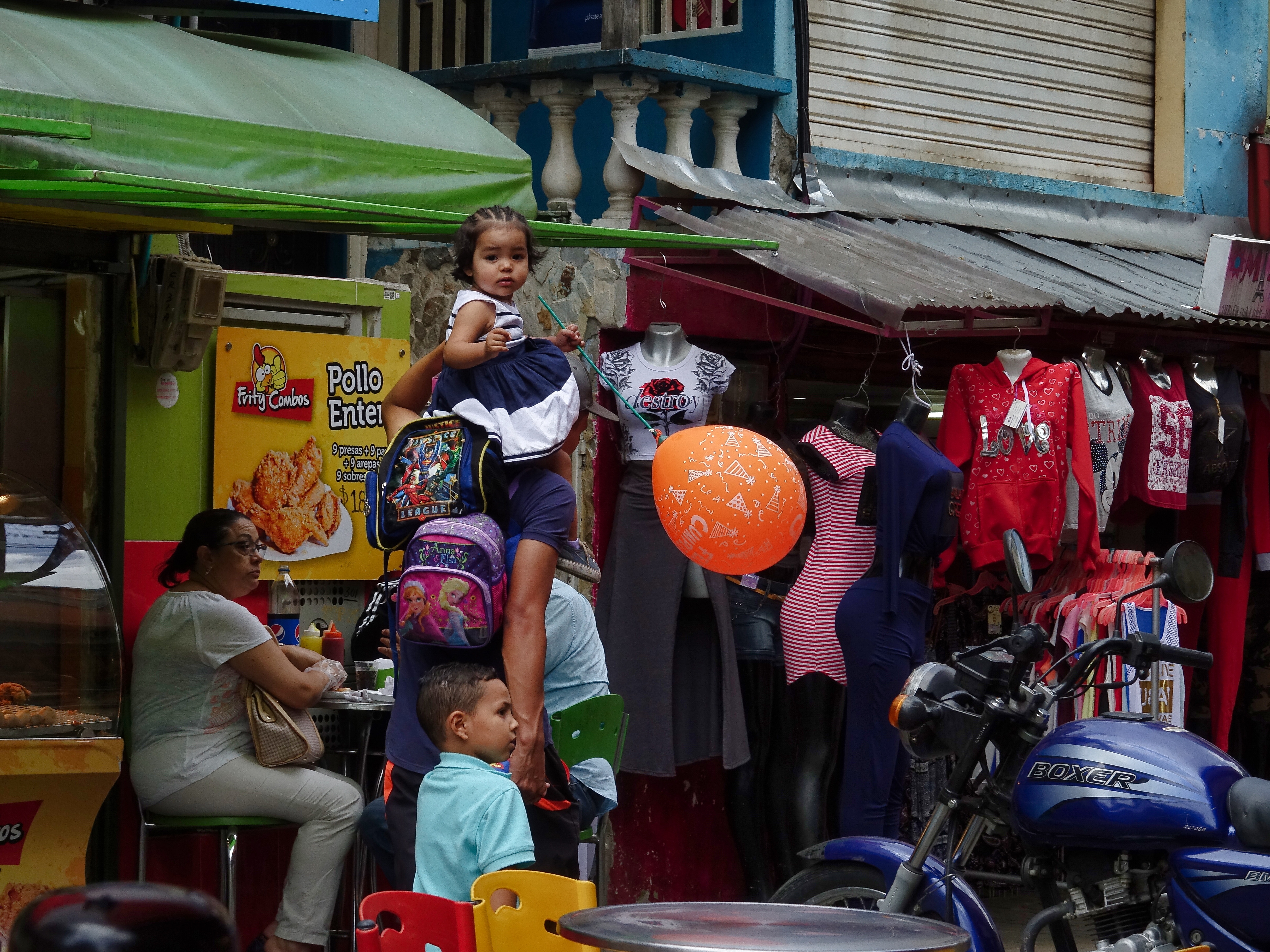 Locals going about their day, young and old