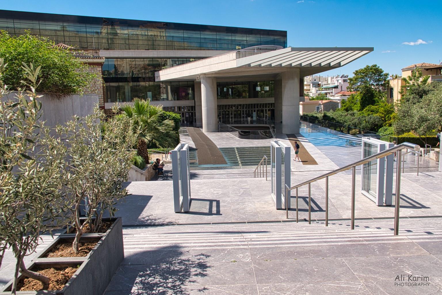The modern Acropolis Museum building under the shadow of the Acropolis was strangely out of place compared to the old Athens all around Athens, Greece, June, 2021, The modern Acropolis Museum building under the shadow of the Acropolis was strangely out of place compared to the old Athens all around