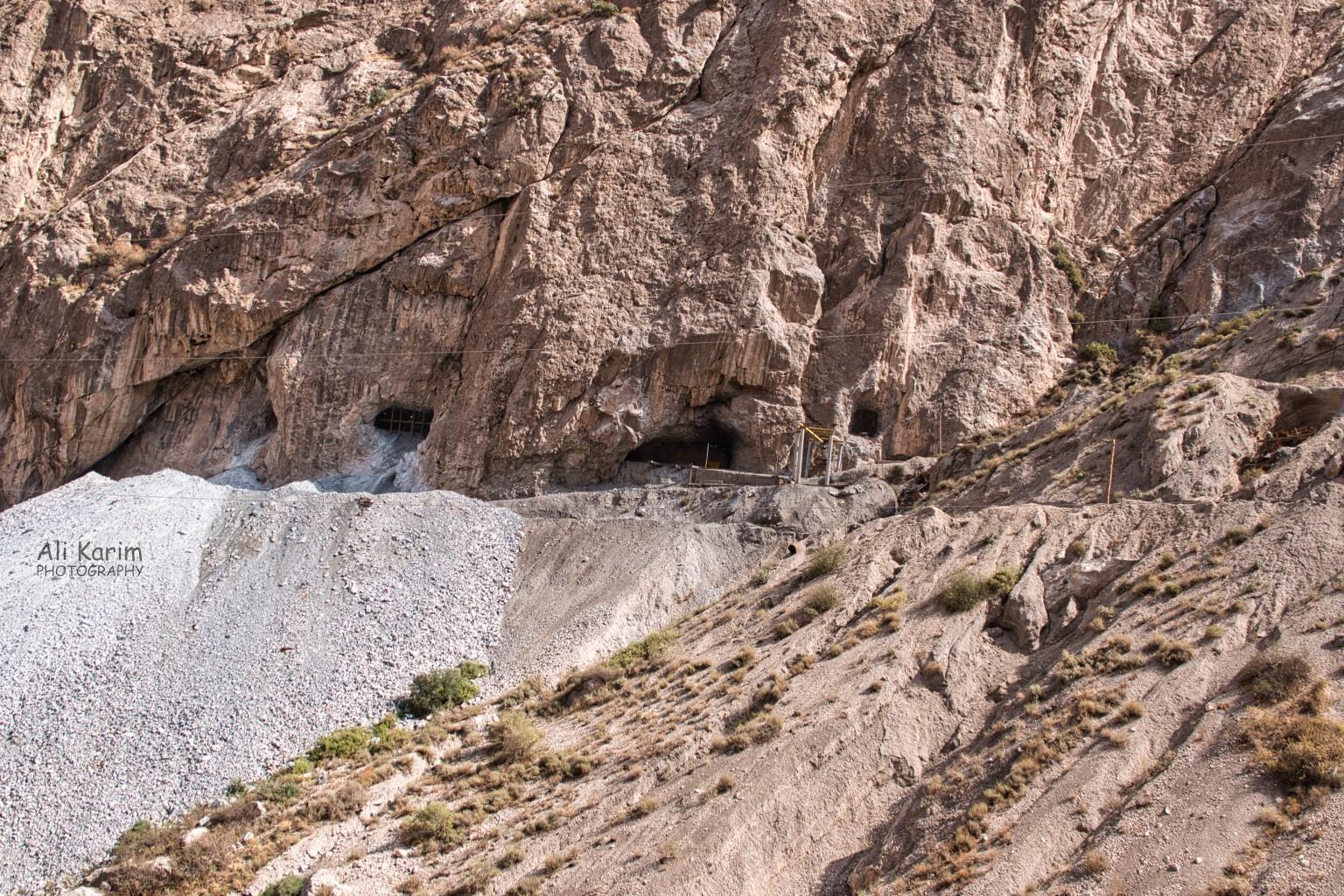 Holes in the mountainsides were actually small scale mines Samarkand, Uzbekistan Holes in the mountainsides were actually small scale mines