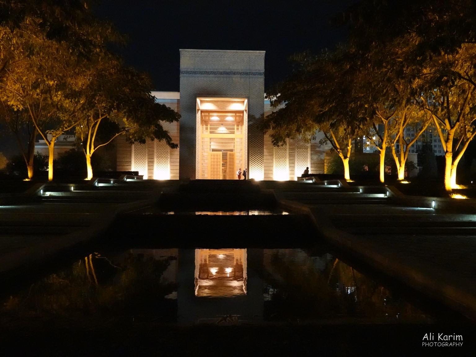 Entrance of the imposing Center at night, with reflective water gardens Dushanbe, Tajikistan Entrance of the imposing Center at night, with reflective water gardens