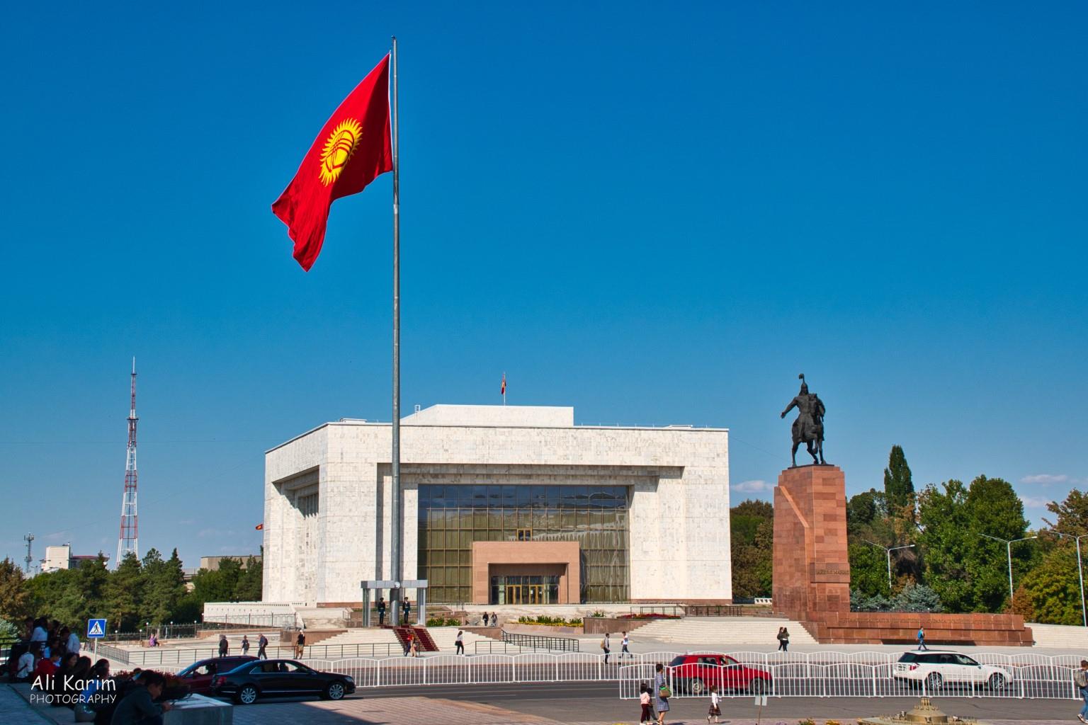 Majestic State History Museum, statue of local hero Manas, and giant national flag Silk Road 14 Bishkek Majestic State History Museum, statue of local hero Manas, and giant national flag