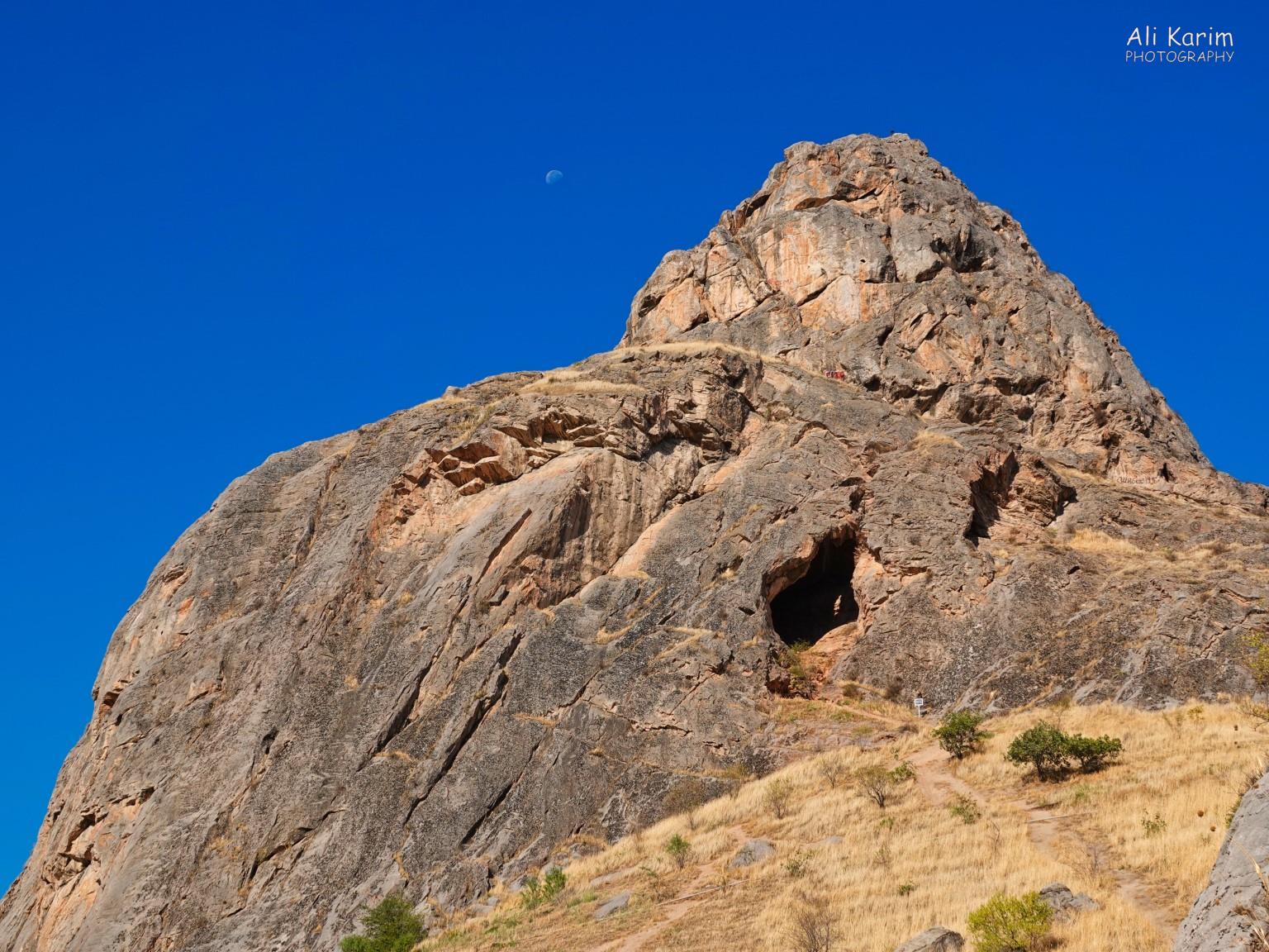 Sulaiman Too mountain hike; note the numerous caves and the half moon Silk Road 16: More Osh, Kyrgyzstan Sulaiman Too mountain hike; note the numerous caves and the half moon