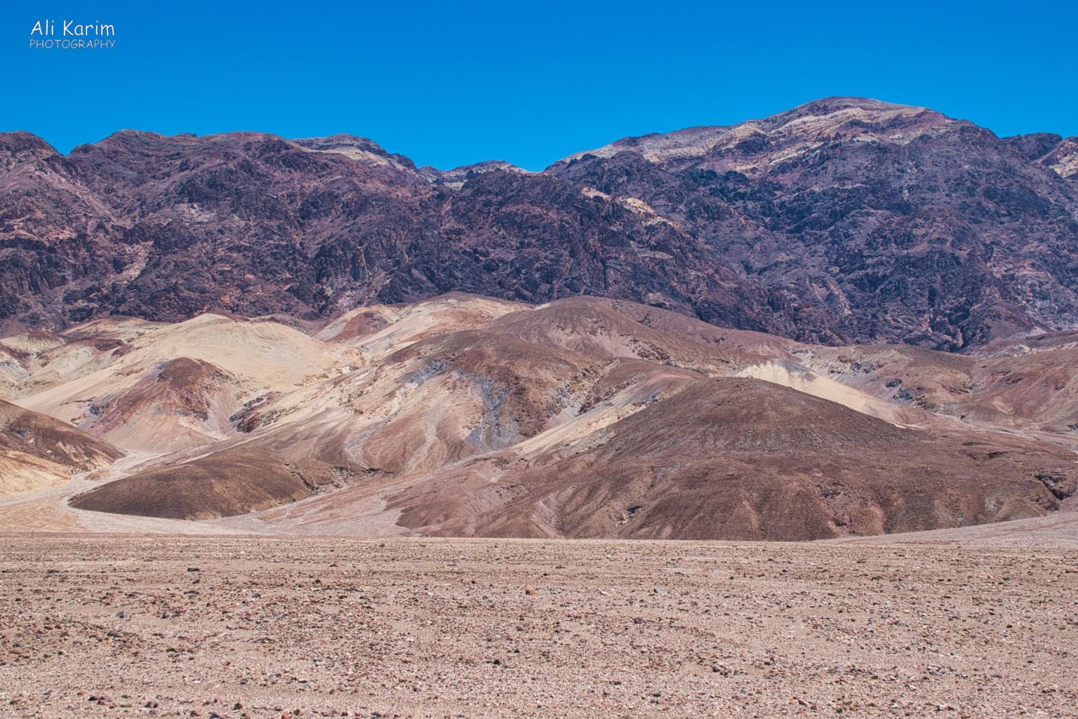 View of Dante’s peak, towering 5,575 ft (1,699 m) above Badwater Basin, on the ridge of the Black Mountains Death Valley National Park, June 2020, View of Dante’s peak, towering 5,575 ft (1,699 m) above Badwater Basin, on the ridge of the Black Mountains
