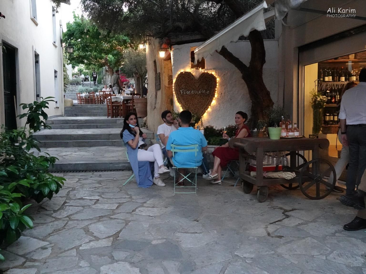 Athens, Greece, June, 2021, Quaint little street restaurants in Plaka with cafes and restaurants