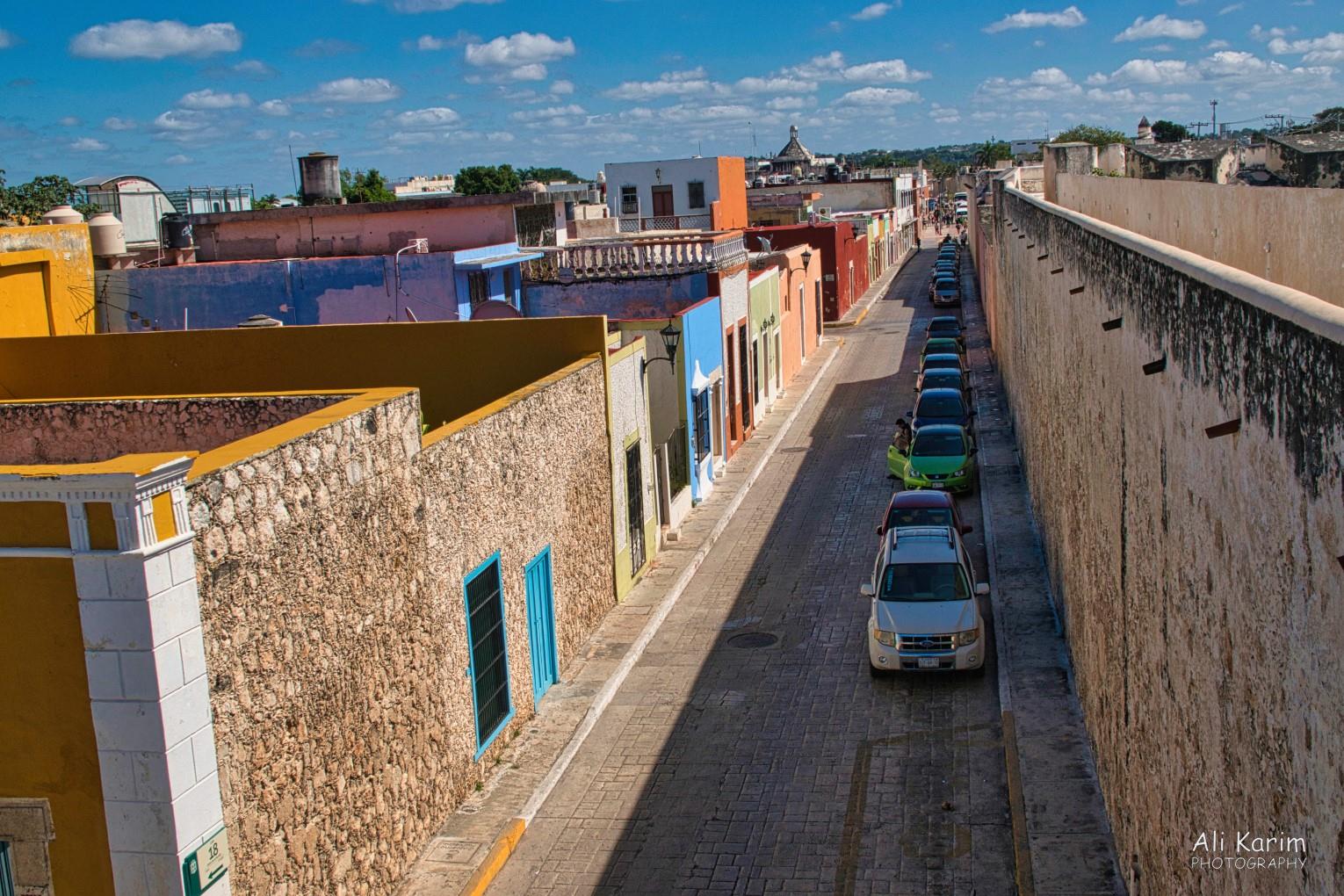 City wall on the right, and adjacent homes in the old city Mérida & Campeche, Yucatan Peninsula, Mexico, Feb 2021, City wall on the right, and adjacent homes in the old city