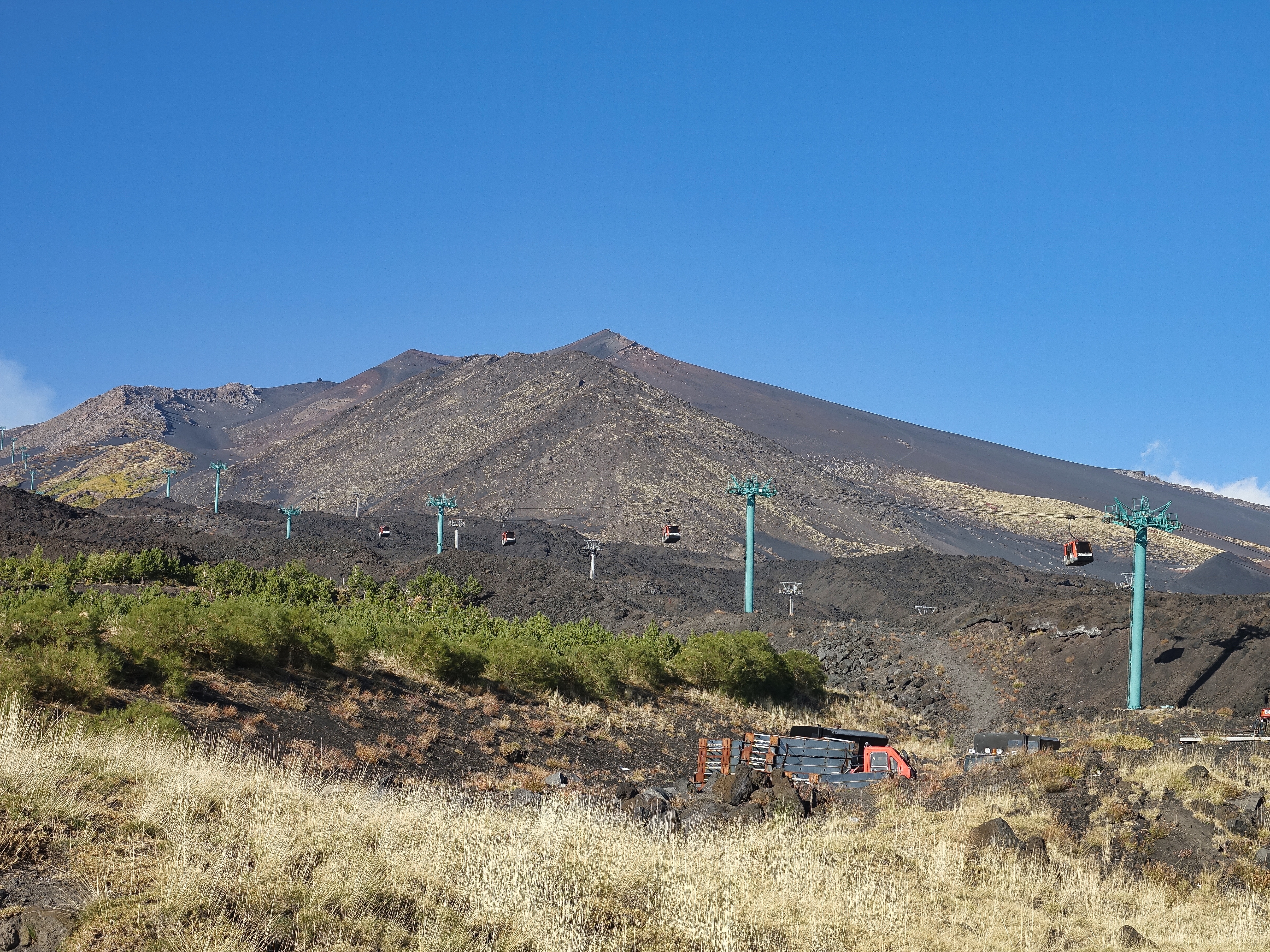 Cable cars going higher up Mt Etna Cable cars going higher up Mt Etna