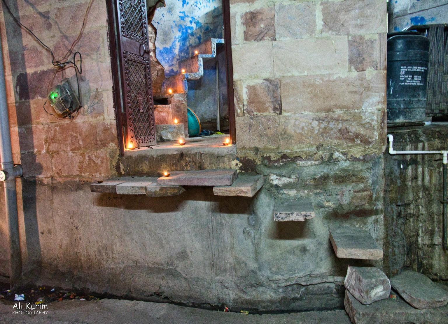 Interesting entrance to a home, complete with diva’s (candles). Note the structure of the steps inside and outside the entrance Jodhpur, Rajasthan Interesting entrance to a home, complete with diva’s (candles). Note the structure of the steps inside and outside the entrance