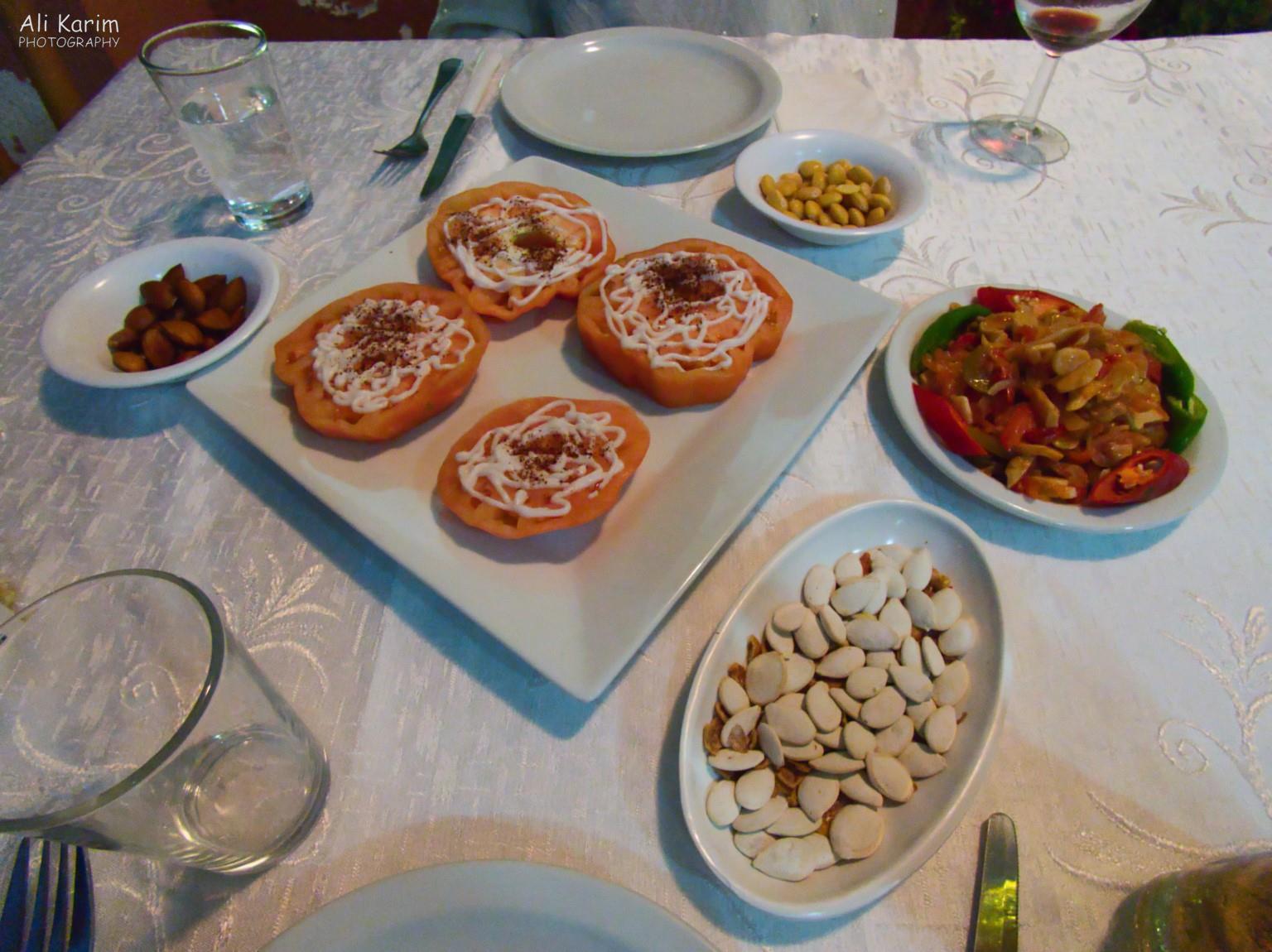 Meal at Mississippi Restaurant. Lebanese salad, nuts, huge tomato slices with garnish, local river trout whole fish, flan, cake and fruit. A most wonderful meal Bsharri and Quadisha Valley Meal at Mississippi Restaurant. Lebanese salad, nuts, huge tomato slices with garnish, local river trout whole fish, flan, cake and fruit. A most wonderful meal