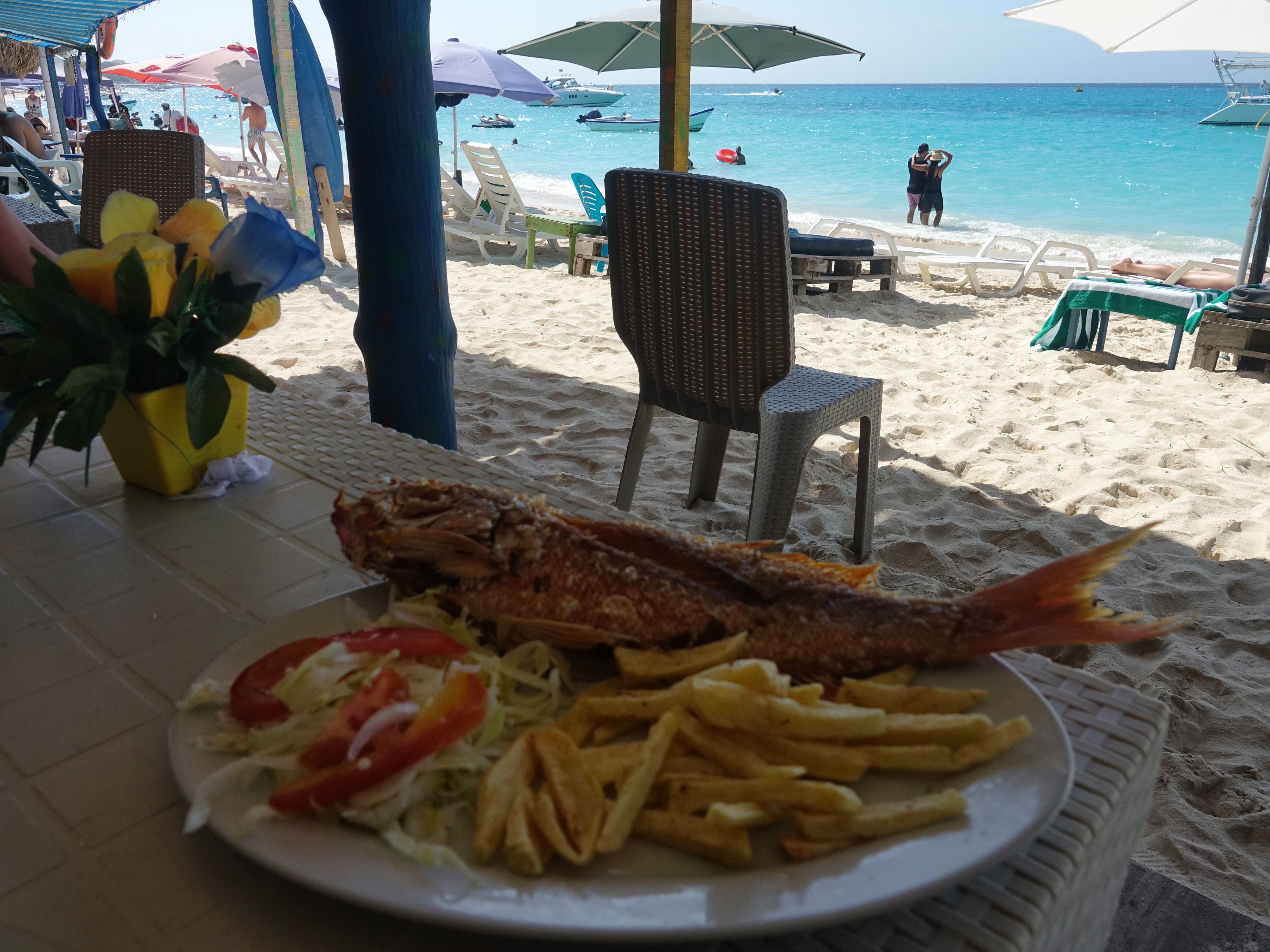 Fresh whole fried fish lunch at the beach