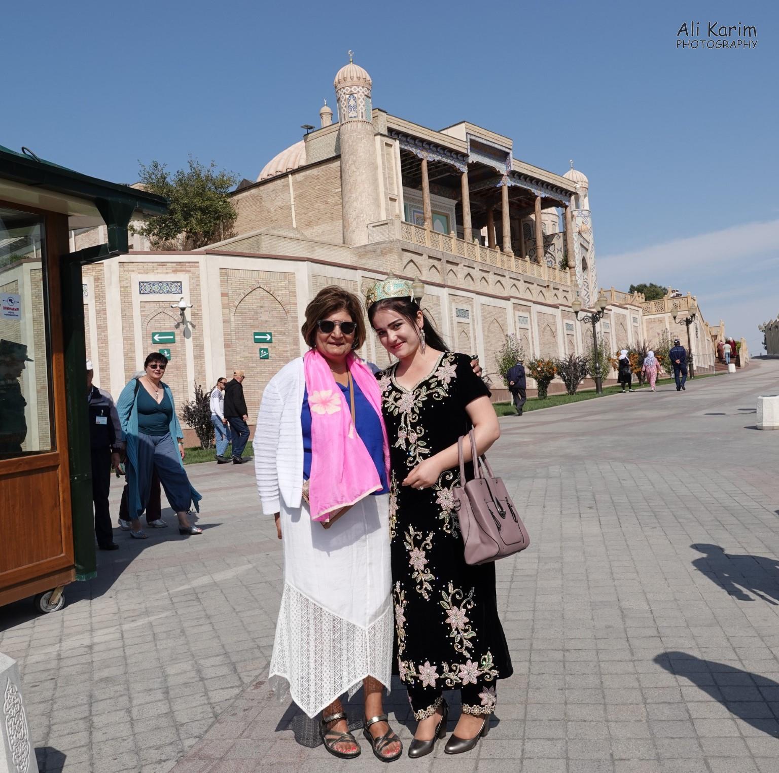 Friendly locals; the building behind them is the Hazrati Hizr mosque and mausoleum of Islom Karmiov, the first president of Uzbekistan More Samarkand, Friendly locals; the building behind them is the Hazrati Hizr mosque and mausoleum of Islom Karmiov, the first president of Uzbekistan
