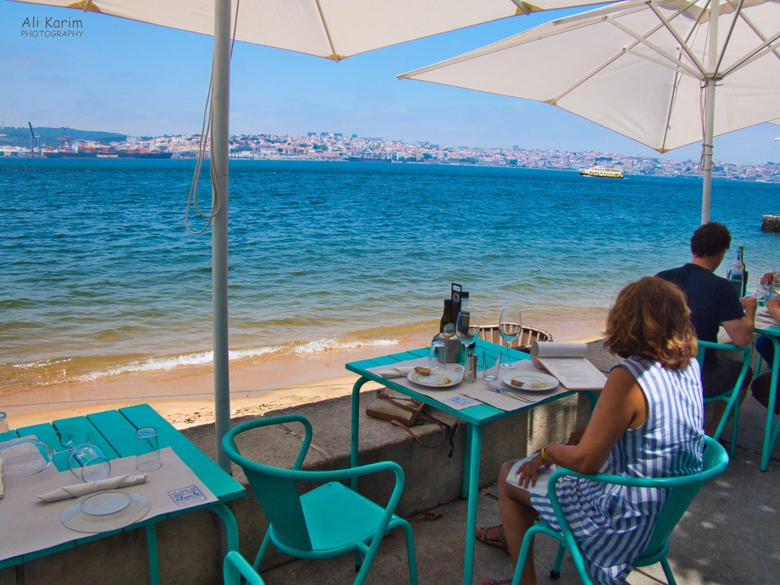 Waterfront dining at the Atira-te ao rio restaurant, views of ships and Lisbon Waterfront dining at the Atira-te ao rio restaurant, views of ships and Lisbon