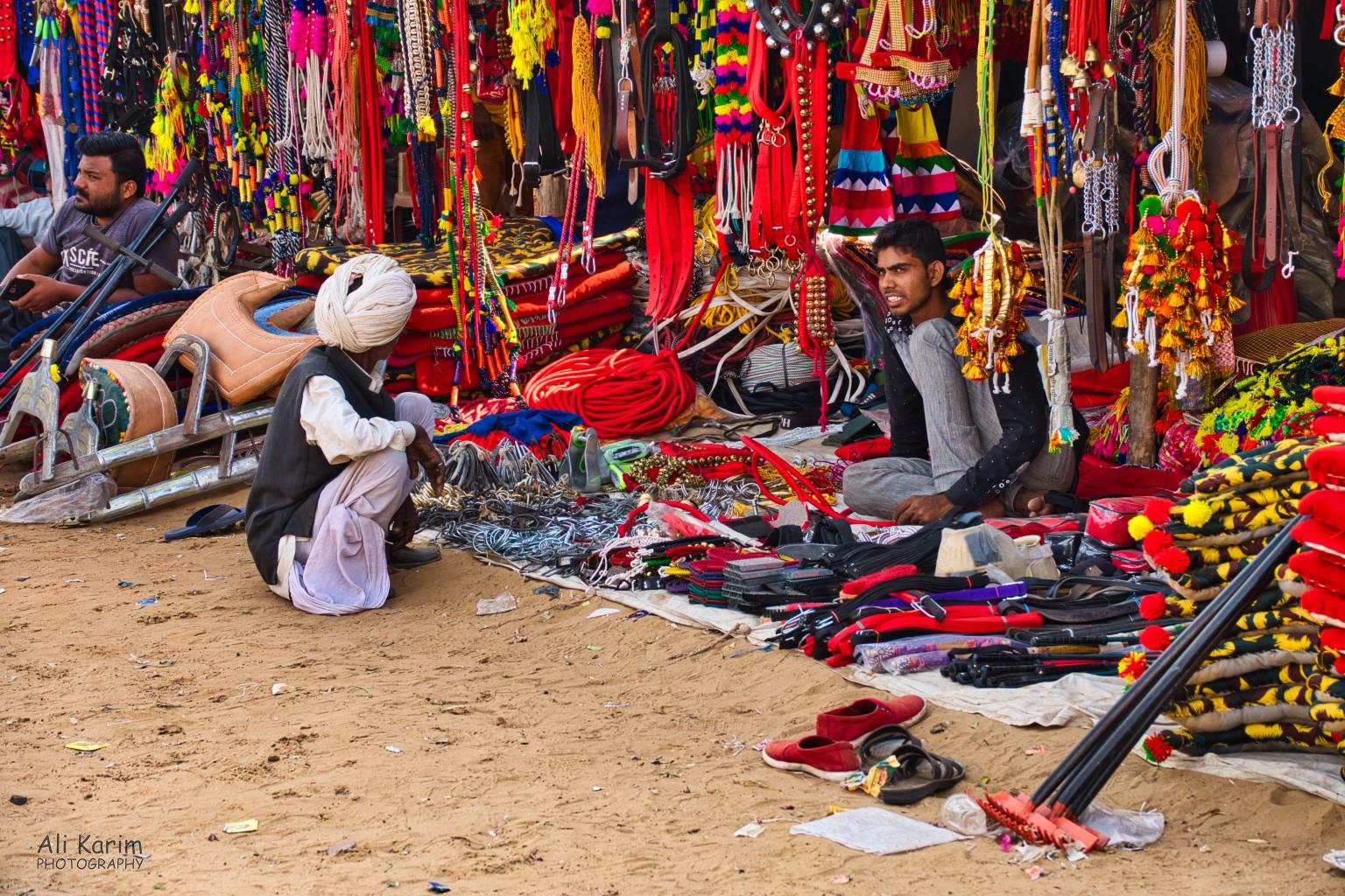 Lots of makeshift shops selling colorful paraphernalia for camels and horses Pushkar, Rajasthan Lots of makeshift shops selling colorful paraphernalia for camels and horses