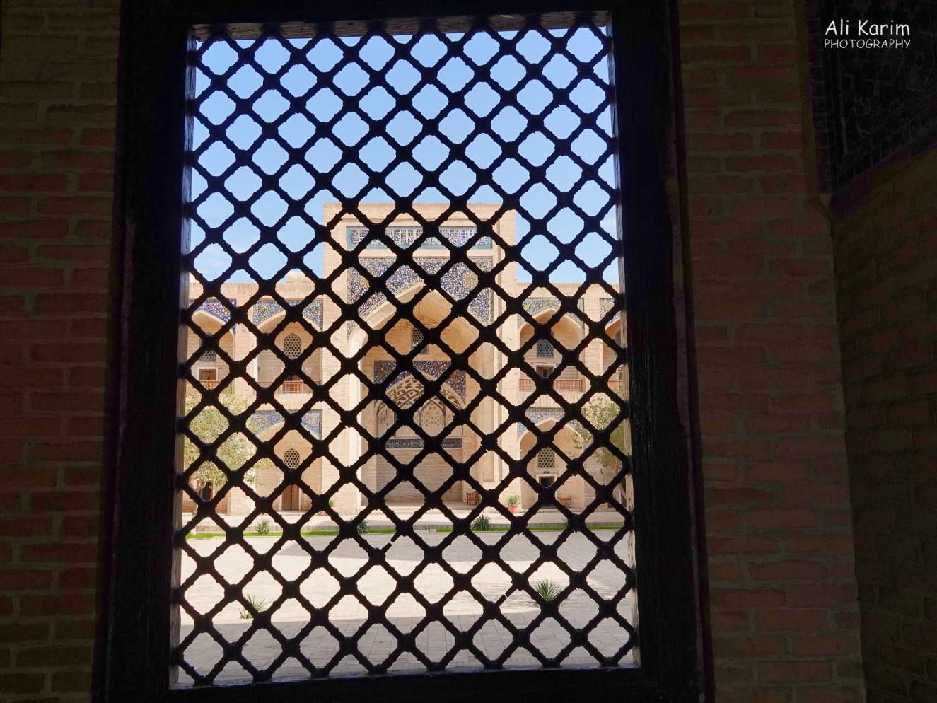 Latticed view of the mosque from the mausoleum inside the madrassah Bukhara, Oct 2019, Latticed view of the mosque from the mausoleum inside the madrassah