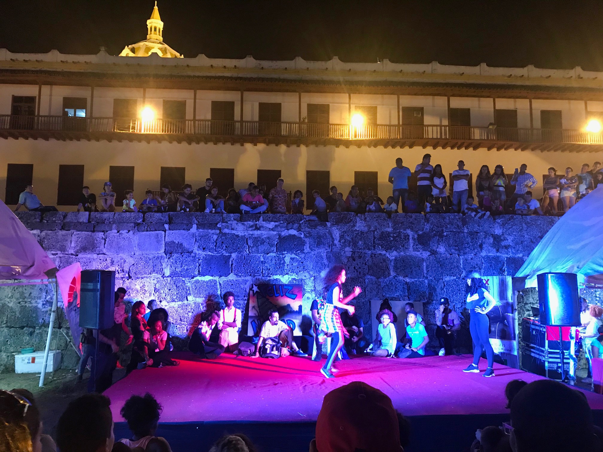 We found one place just outside the wall that had a food festival and a stage with dance-off competitions going. We found one place just outside the wall that had a food festival and a stage with dance-off competitions going.