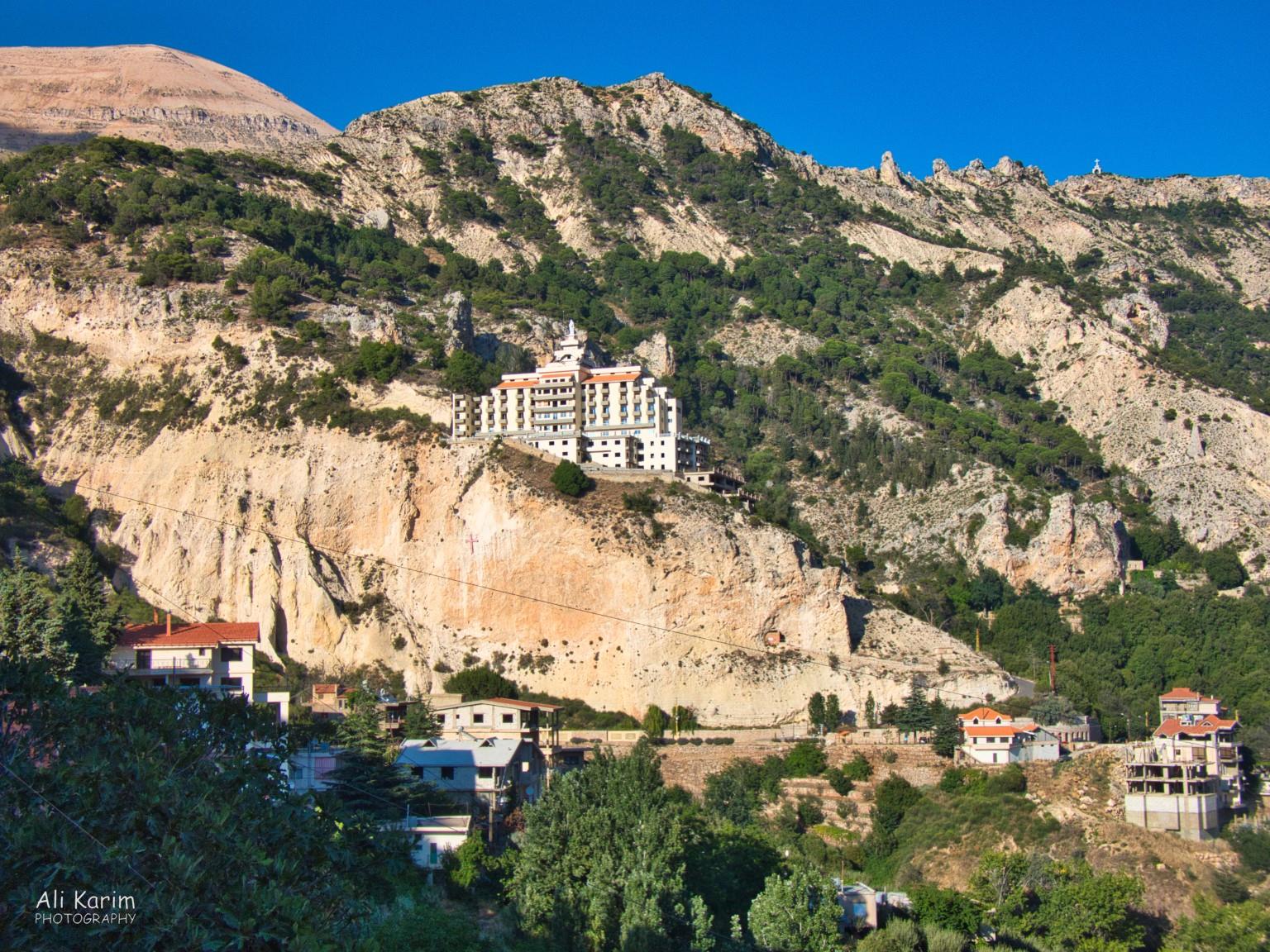 Monastery near Bsharri; note the cross on the cliff below the building, and on the mountain above Bsharri and Quadisha Valley Monastery near Bsharri; note the cross on the cliff below the building, and on the mountain above