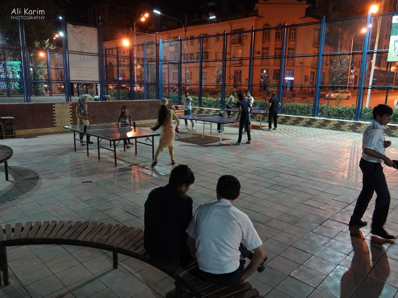Locals enjoying table tennis and indoor soccer inside one of the parks, at night, with families. Very safe. Dushanbe, Tajikistan Locals enjoying table tennis and indoor soccer inside one of the parks, at night, with families. Very safe.