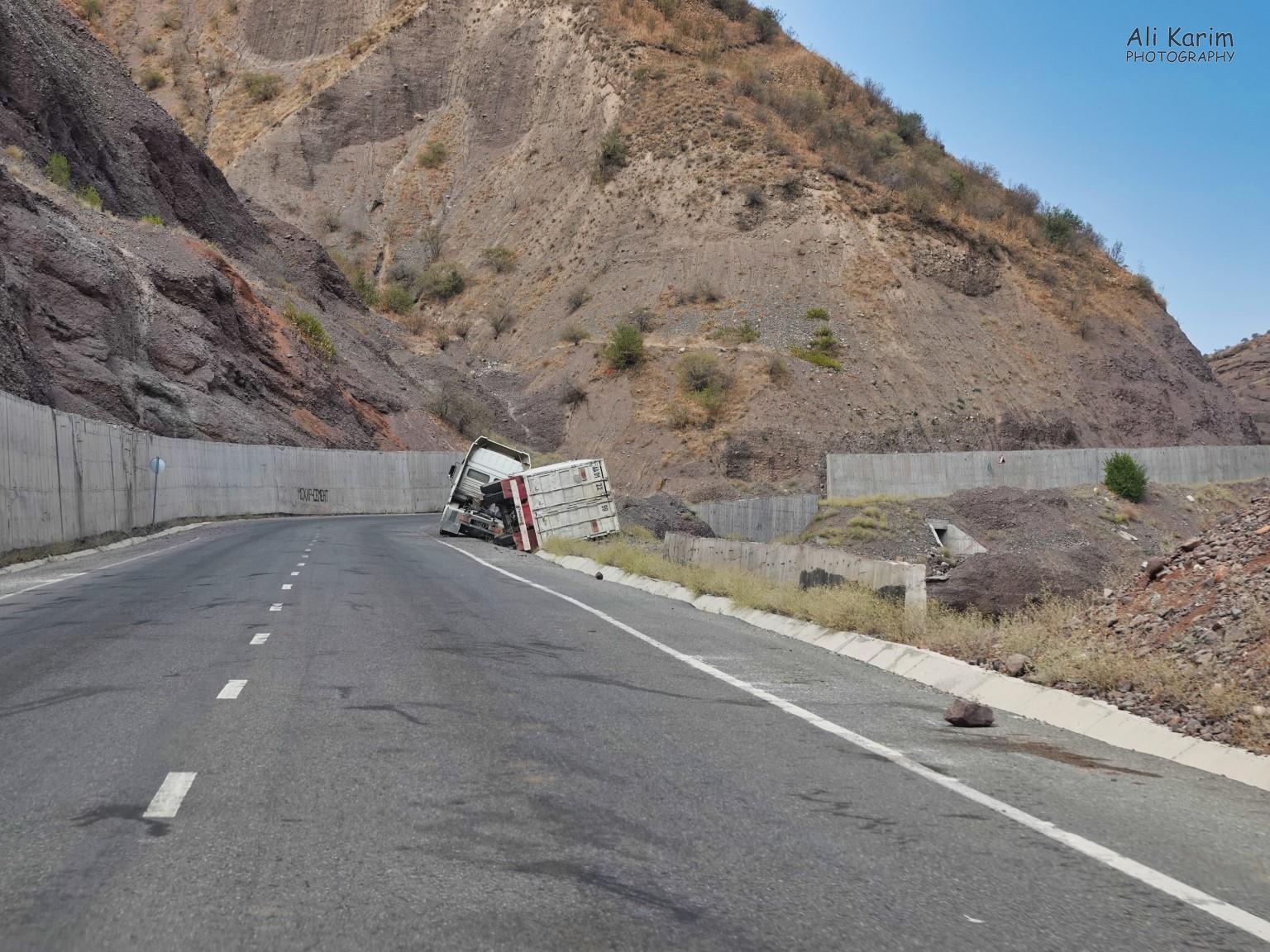 Roads started improving a lot with paving and lane markings; but still had rough patches, landslides and was still dangerous. Dushanbe, Tajikistan Roads started improving a lot with paving and lane markings; but still had rough patches, landslides and was still dangerous.