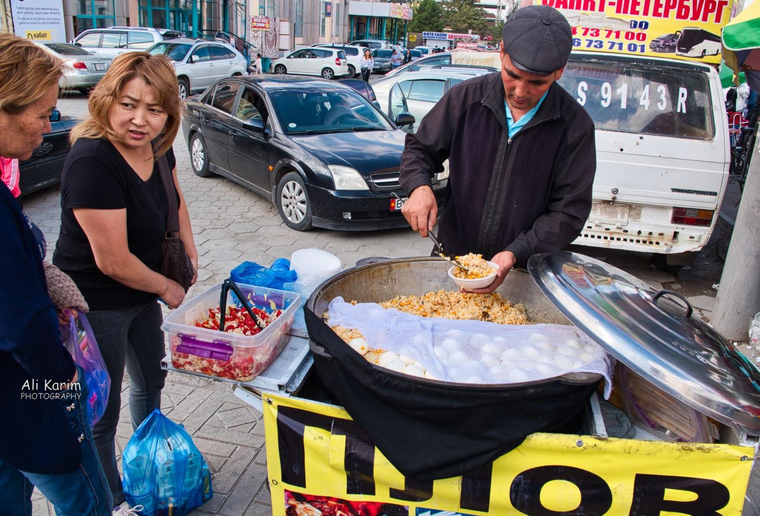 This guy was selling plov, the popular pilaf dish in this central asia; consisting of rice, some vegetables and meat. Silk Road 14 BishkekThis guy was selling plov, the popular pilaf dish in this central asia; consisting of rice, some vegetables and meat.